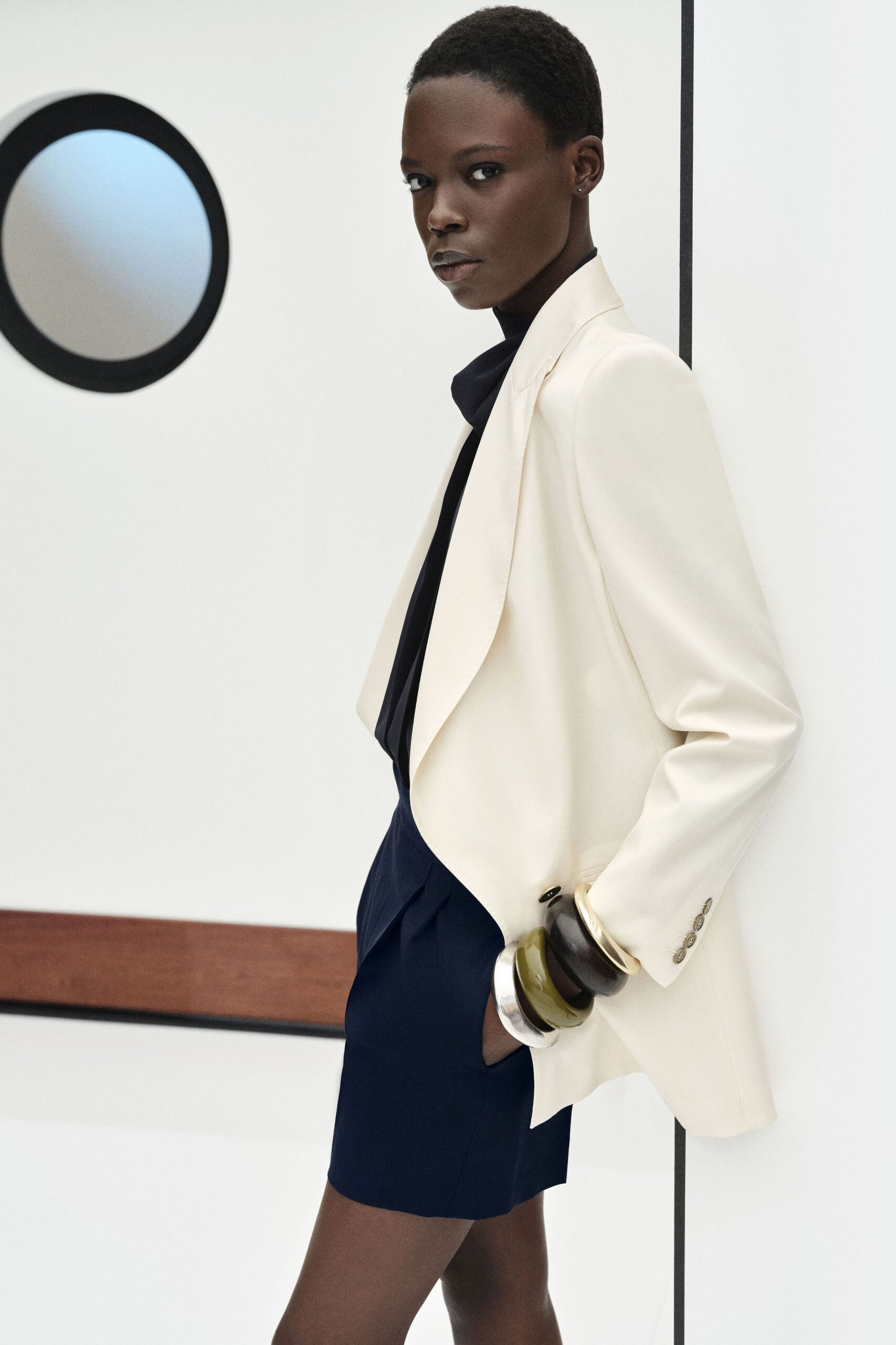 white tailored blazer with black top