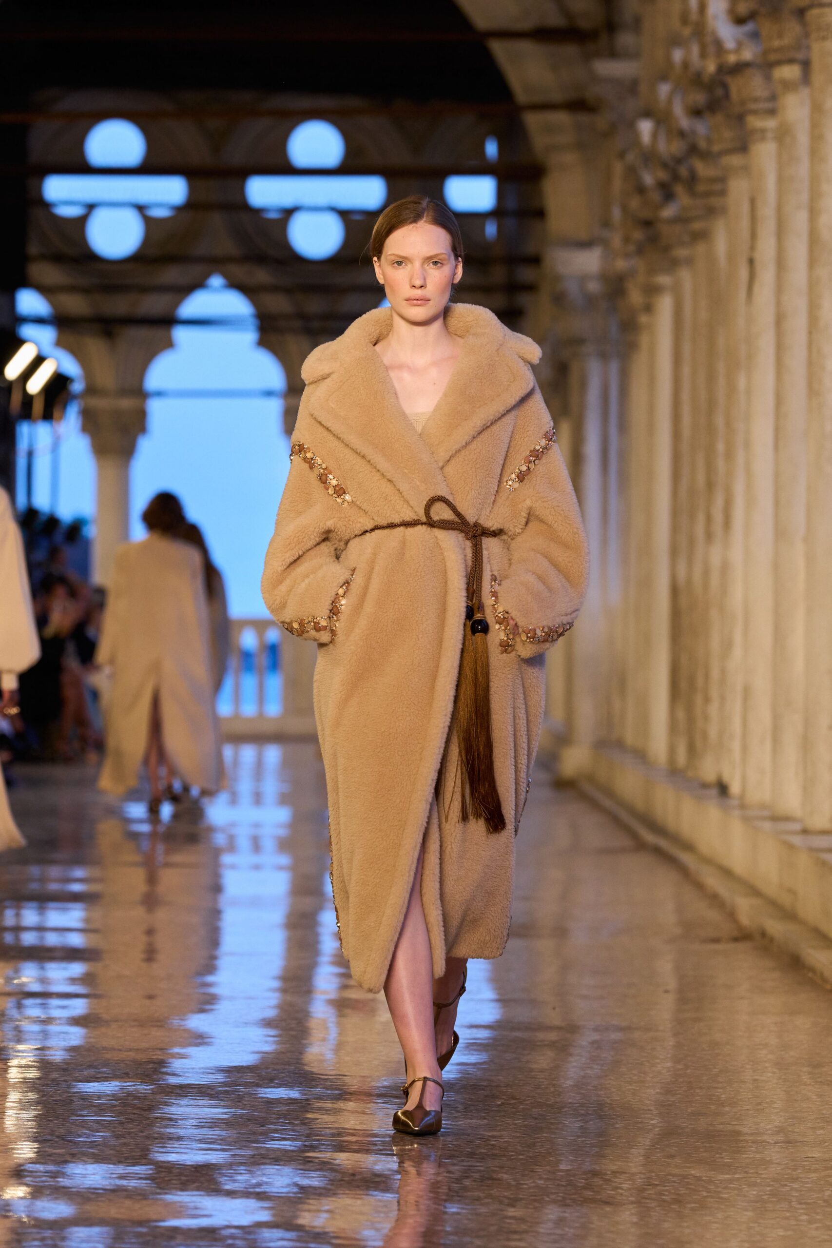 beige fur belted coat with brown shoes