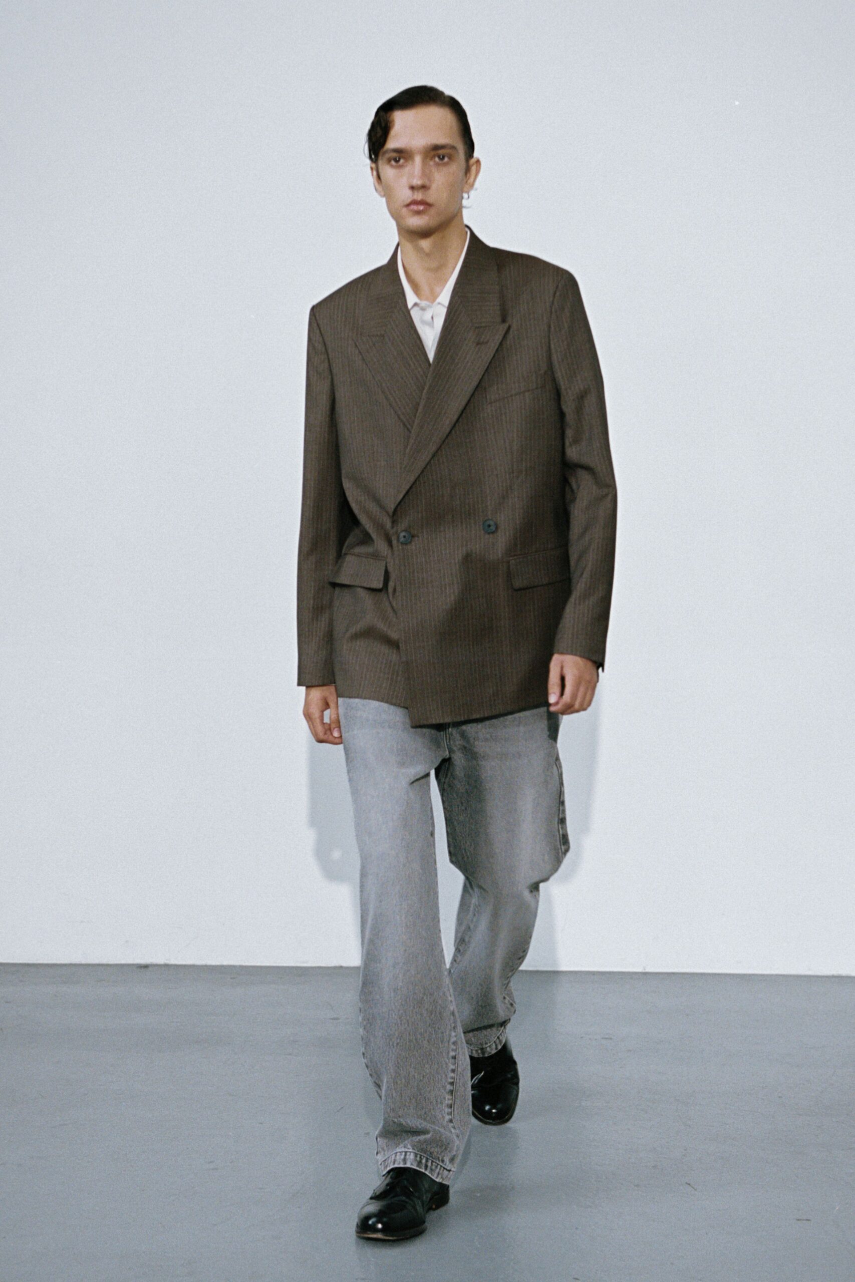 brown checked blazer with gray pants
