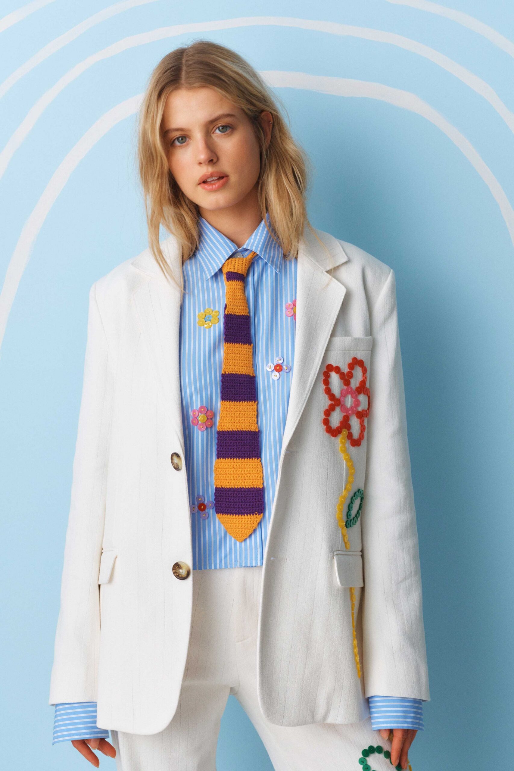 white tailored blazer with striped shirt