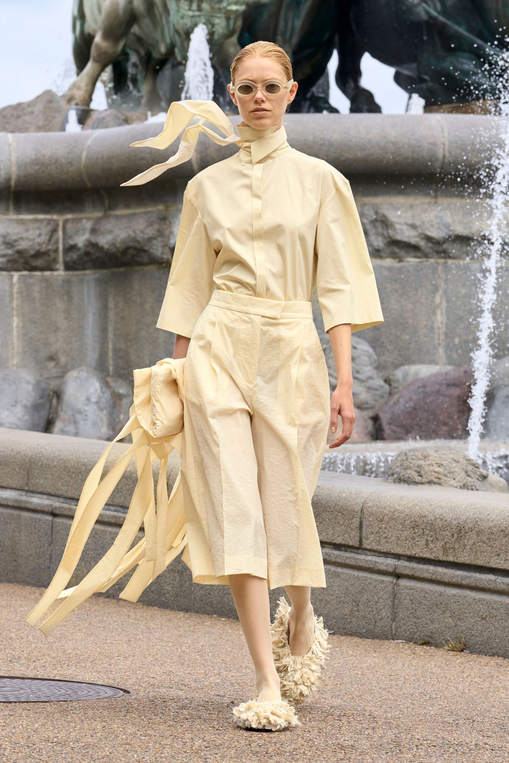 yellow cotton relaxed high-waisted pleated midi pants