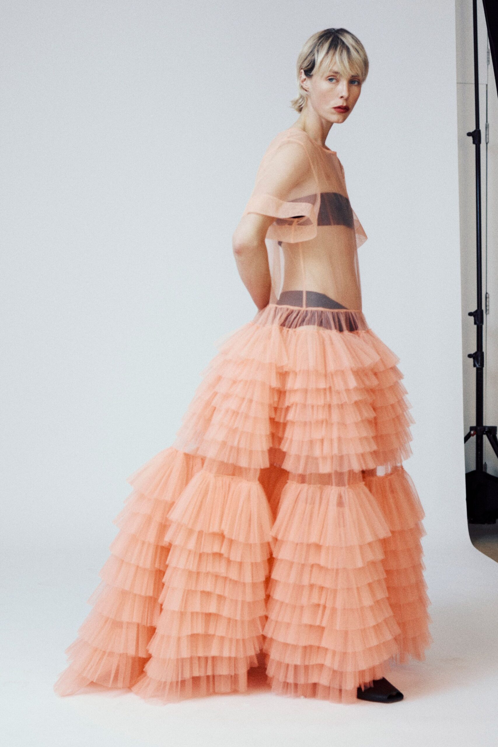pink tulle sleeveless v-neck fitted tiered ruffled gown