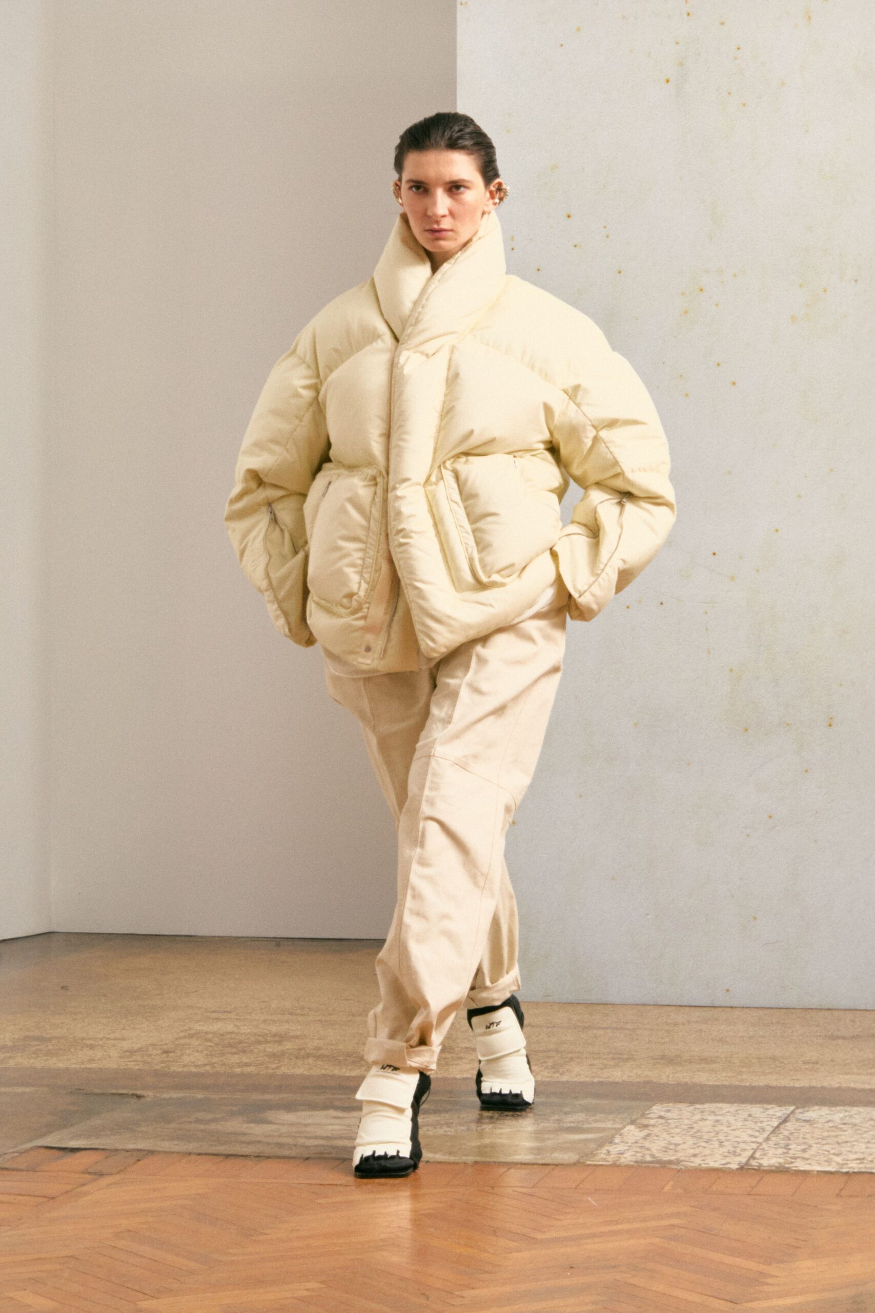 beige oversized padded jacket with relaxed pants