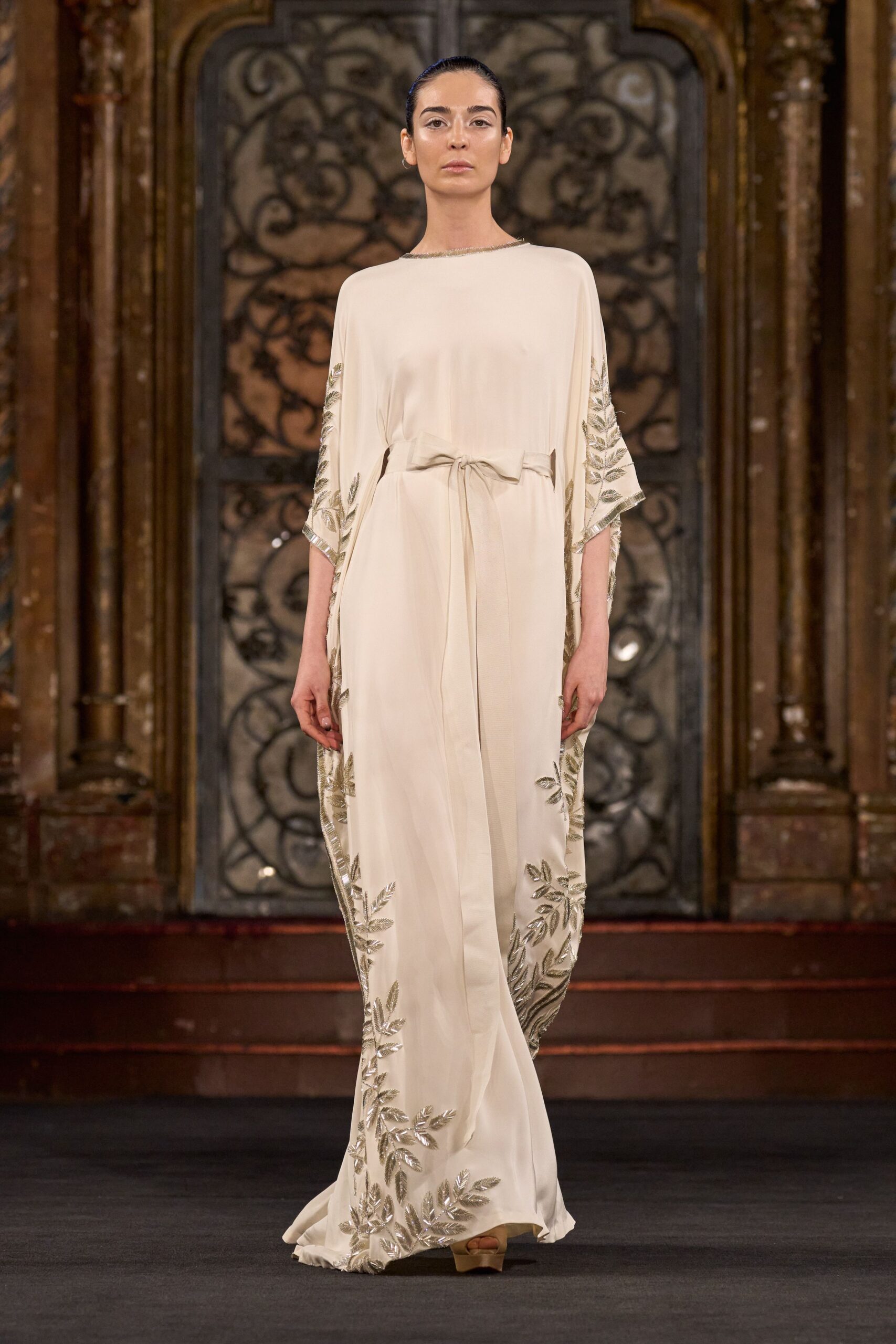ivory silk sleeveless high-neck relaxed embroidered flowing gown