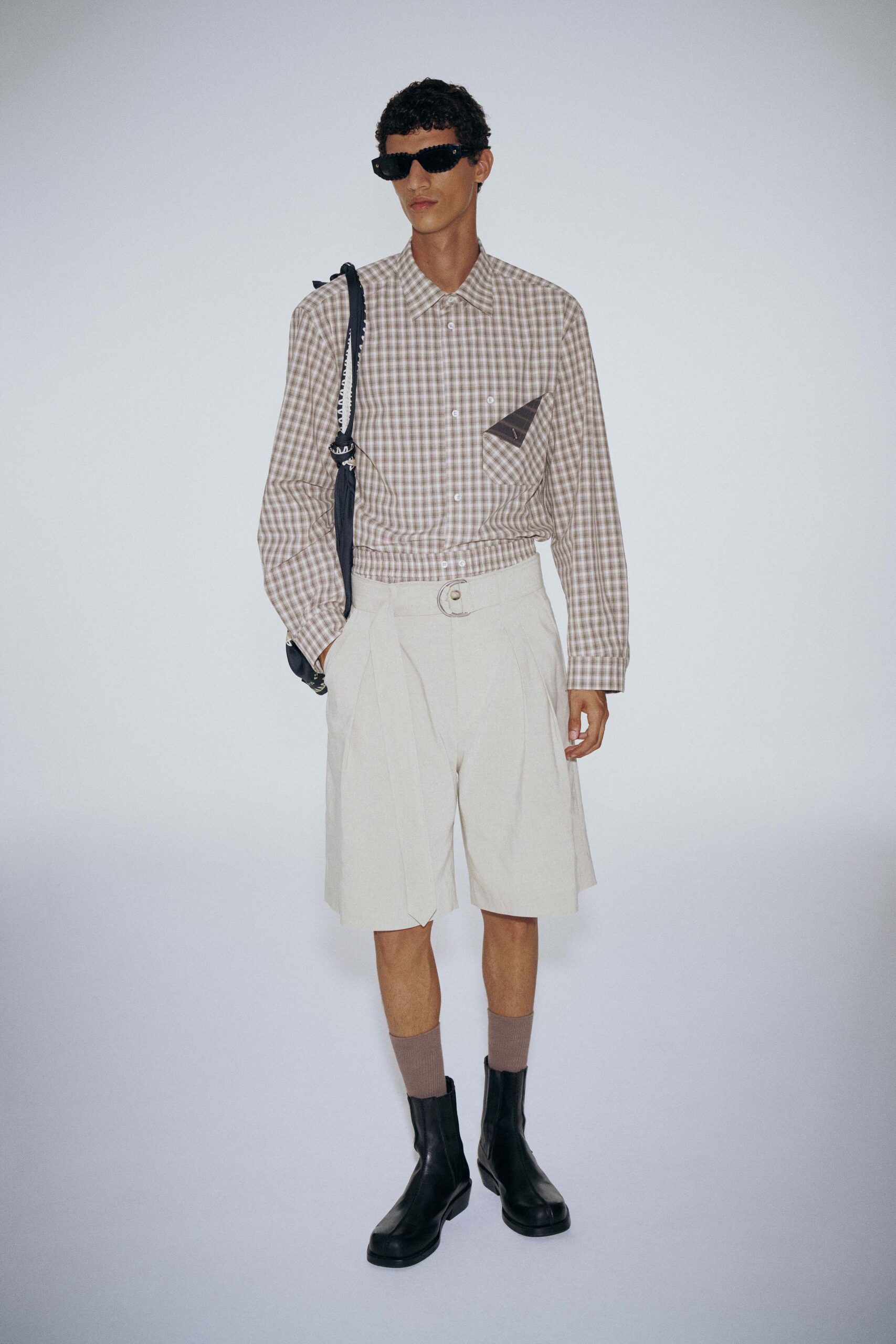 beige checked shirt with white shorts