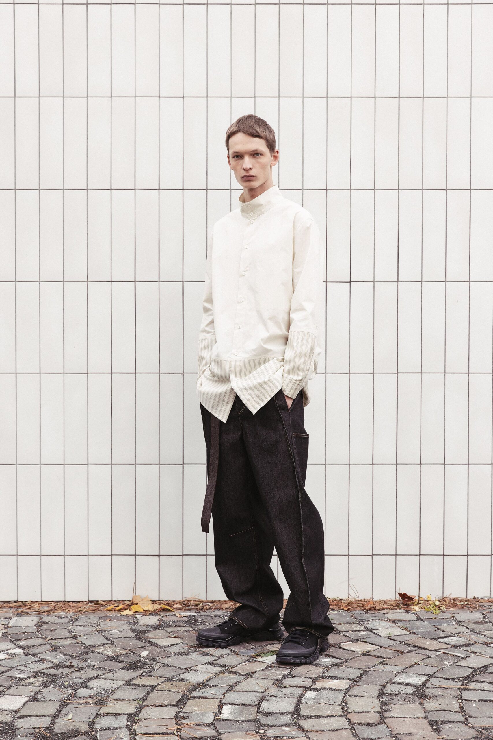 white relaxed shirt black pants