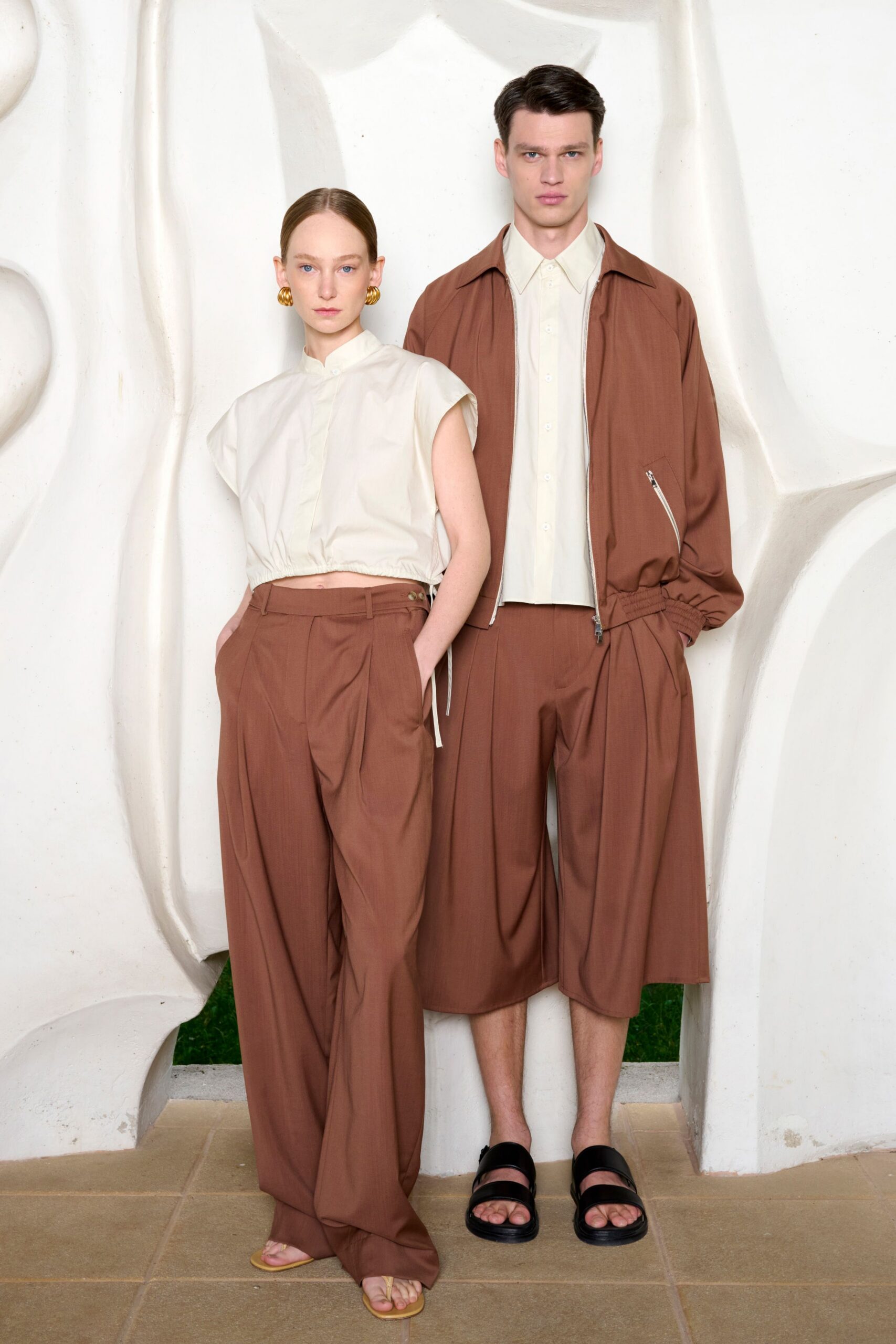 white shirt brown pants jacket shorts sandals