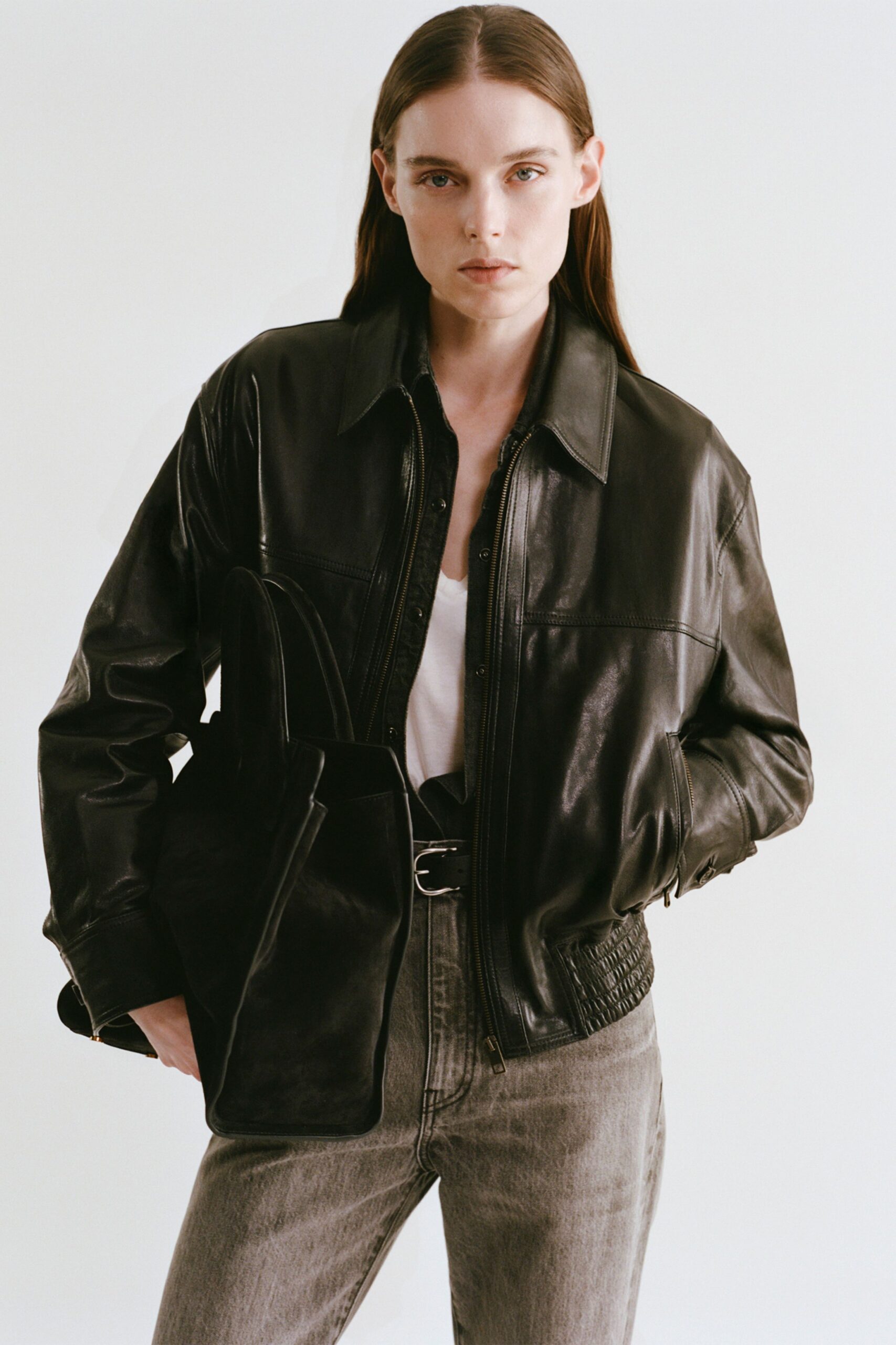 black leather jacket with white top