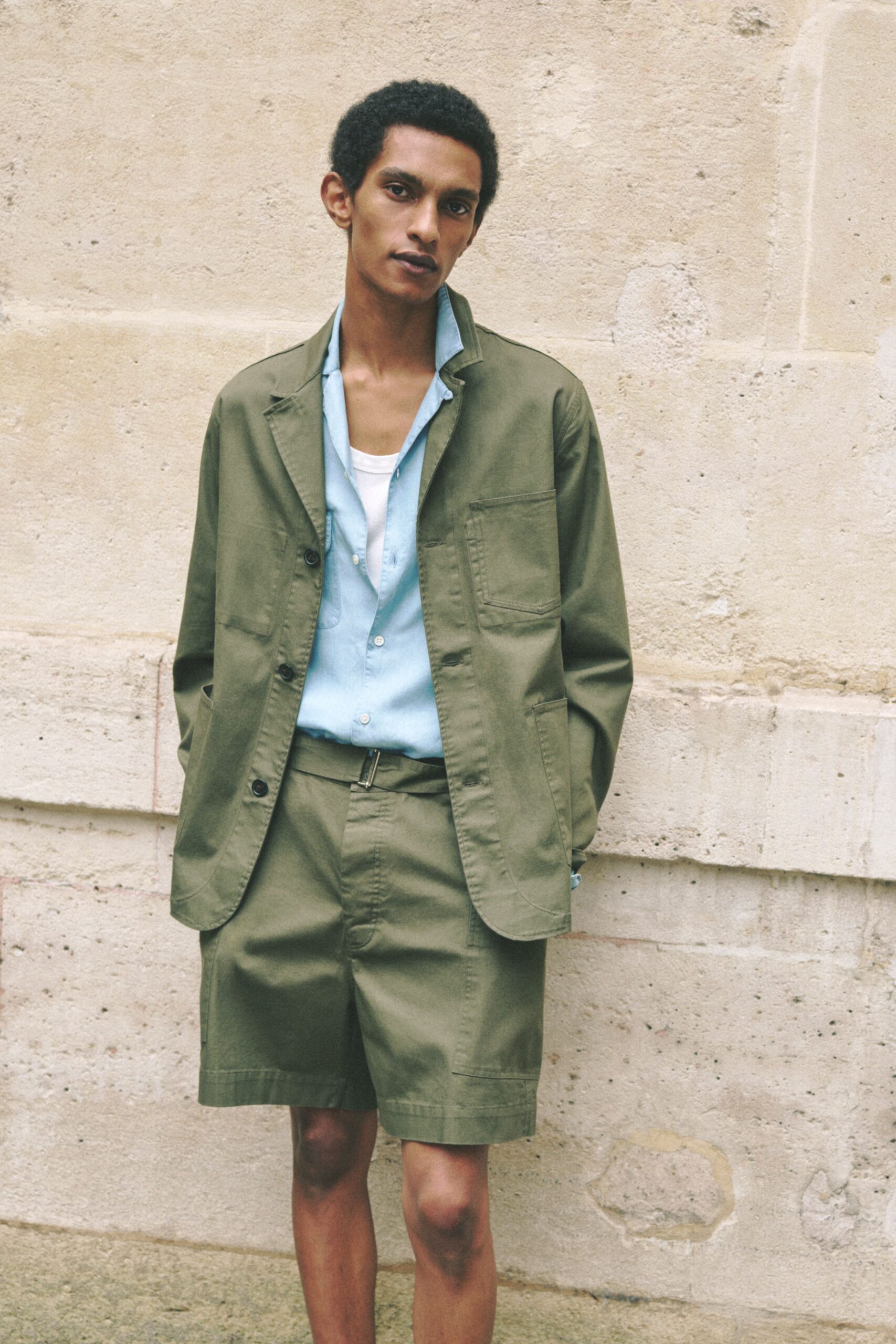 green relaxed jacket with blue shirt