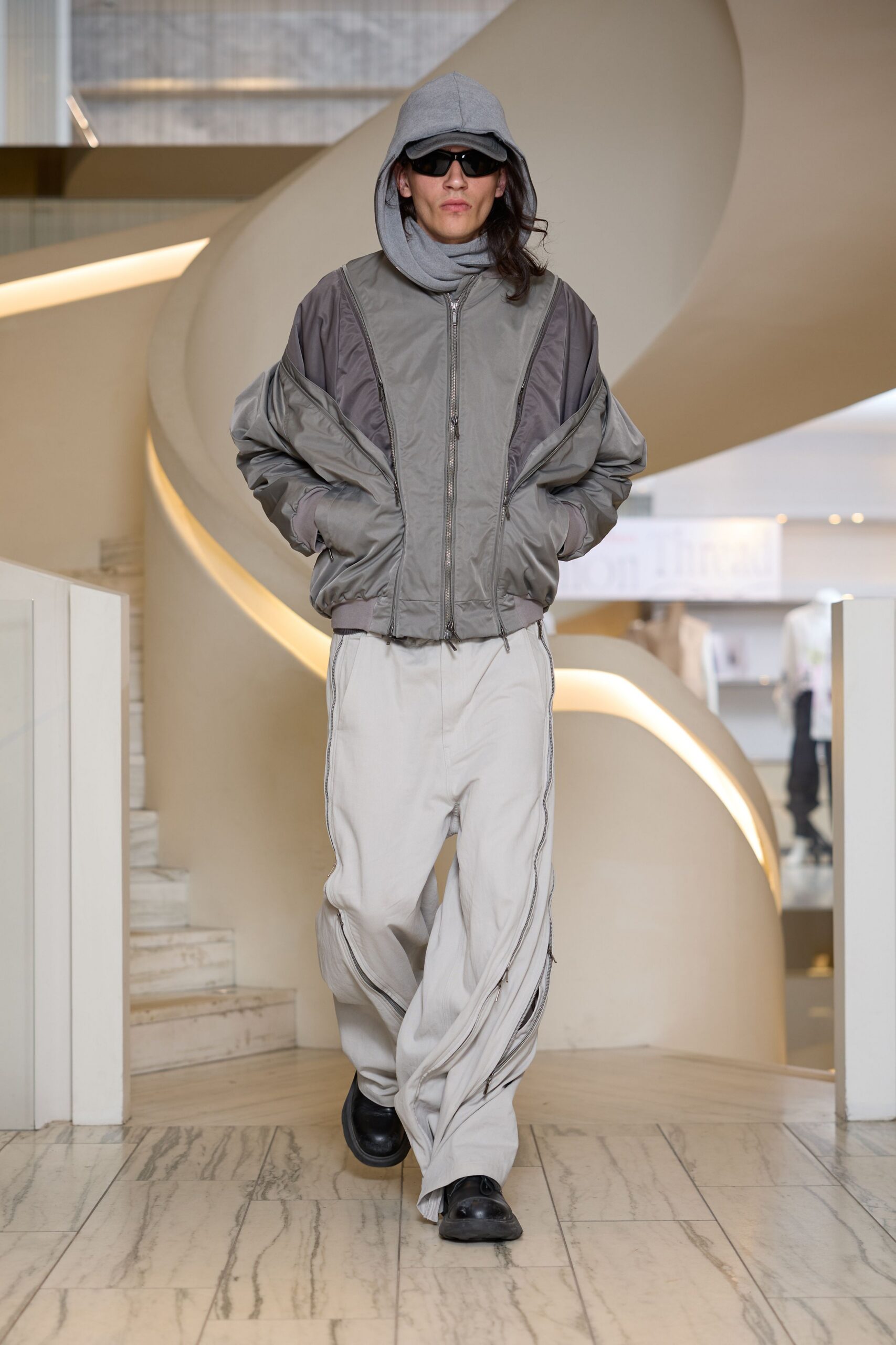gray relaxed jacket with beige pants