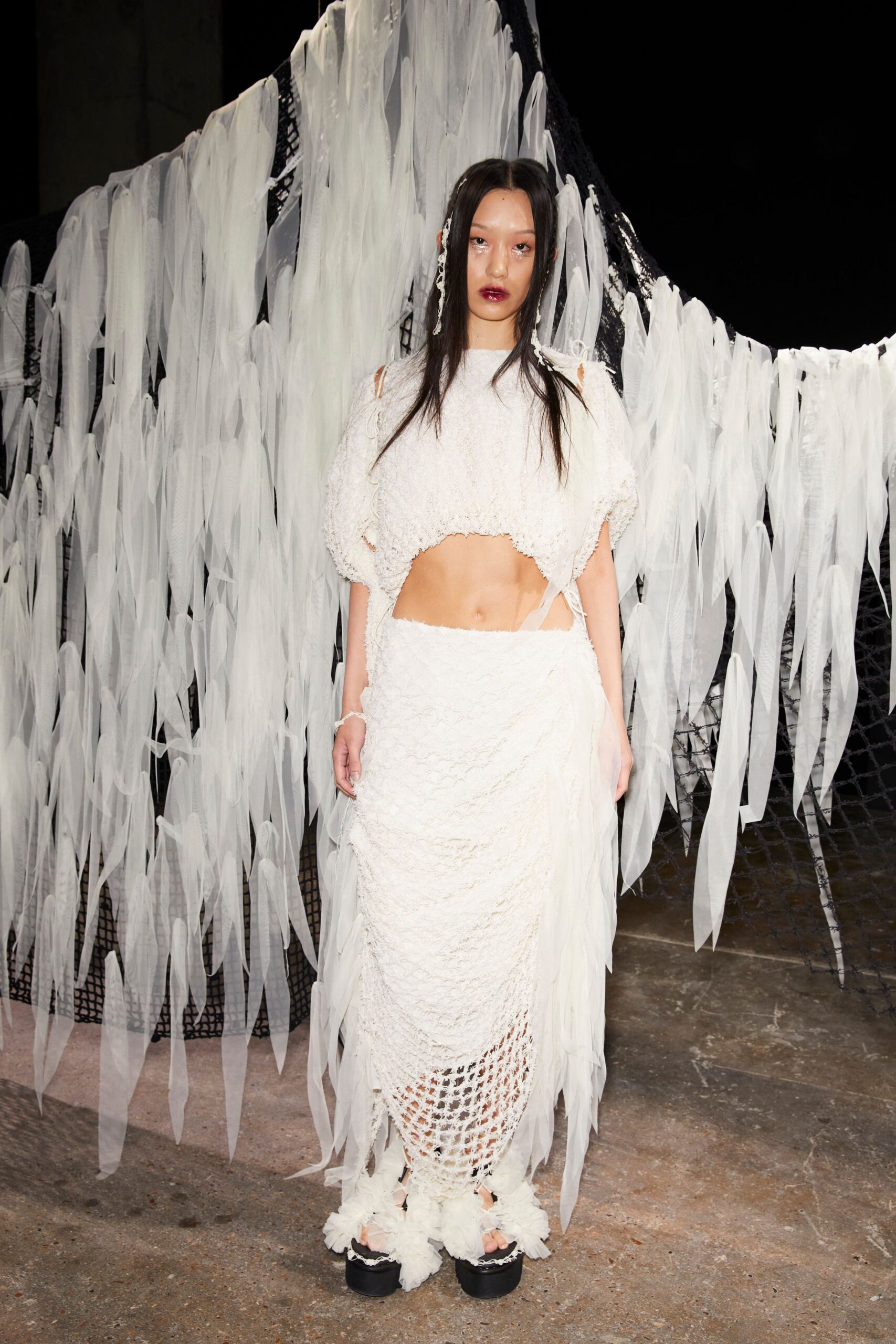 white fringed midi dress with black shoes