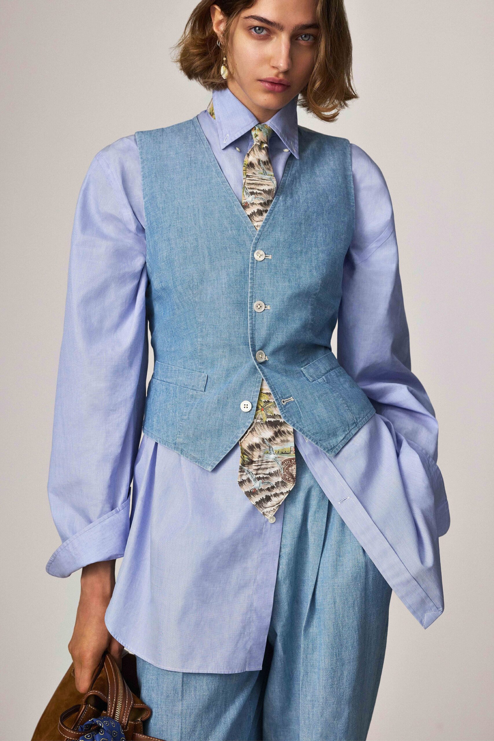 blue cotton long-sleeve collared fitted buttoned vest
