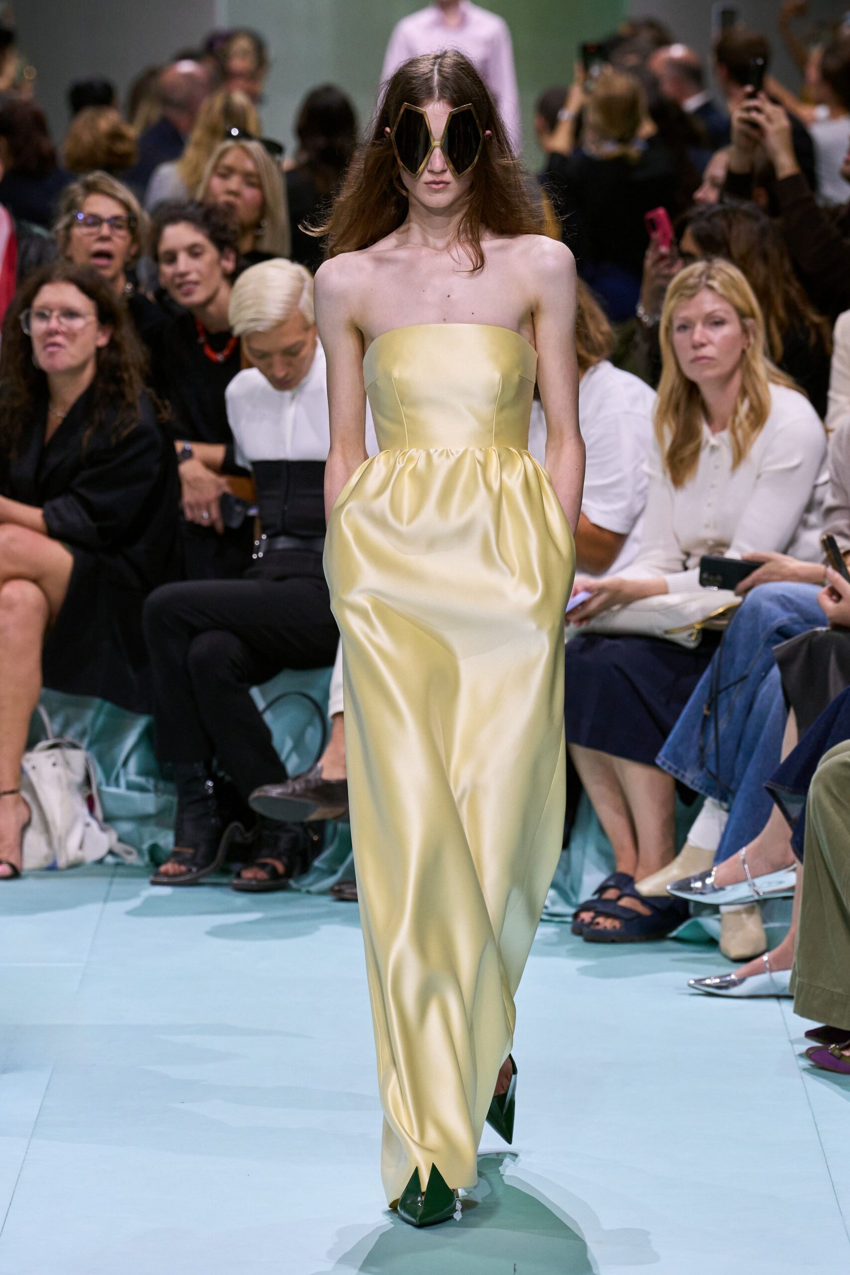 yellow satin strapless fitted pockets flowing maxi gown