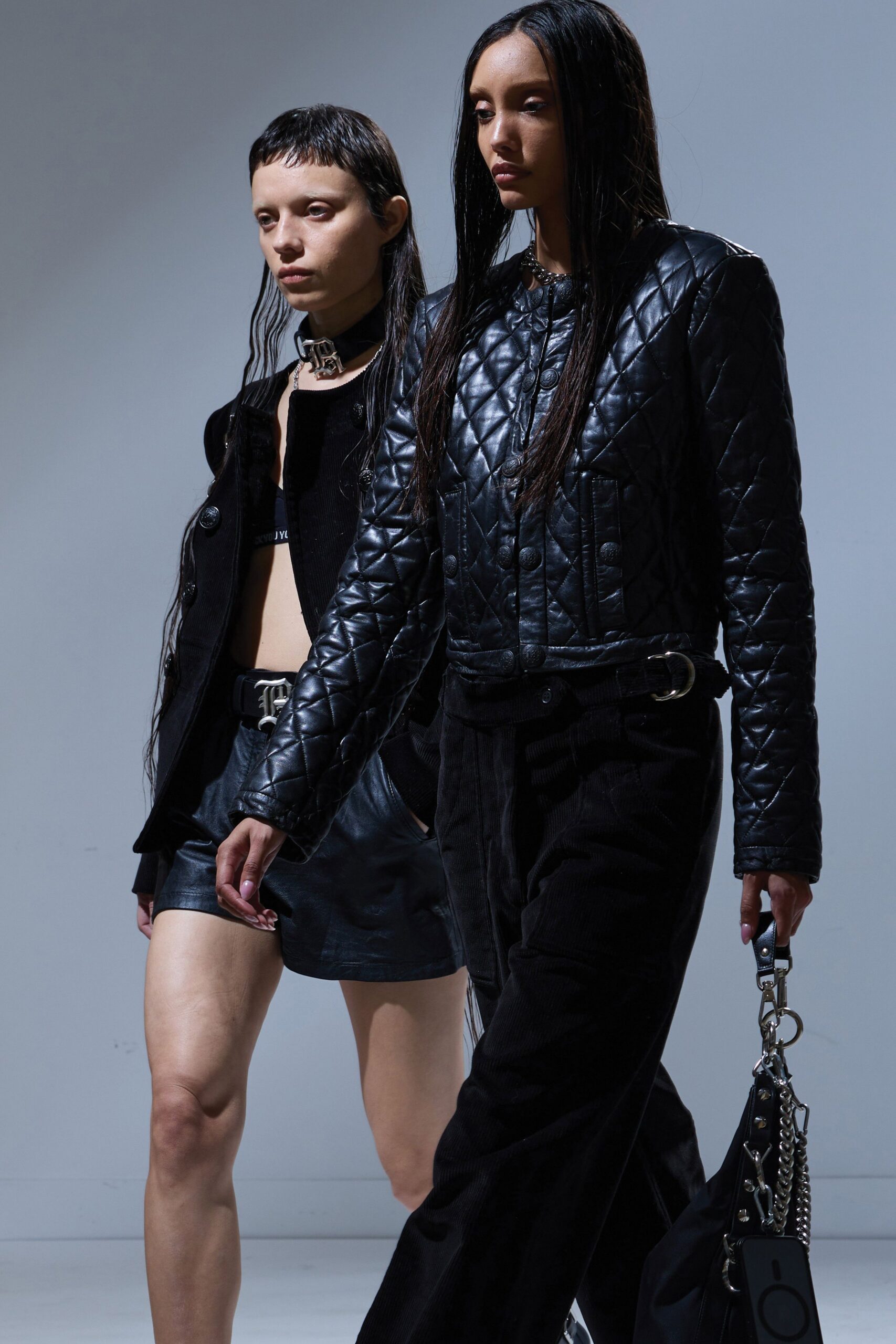 black cotton long-sleeve collared fitted quilted jacket