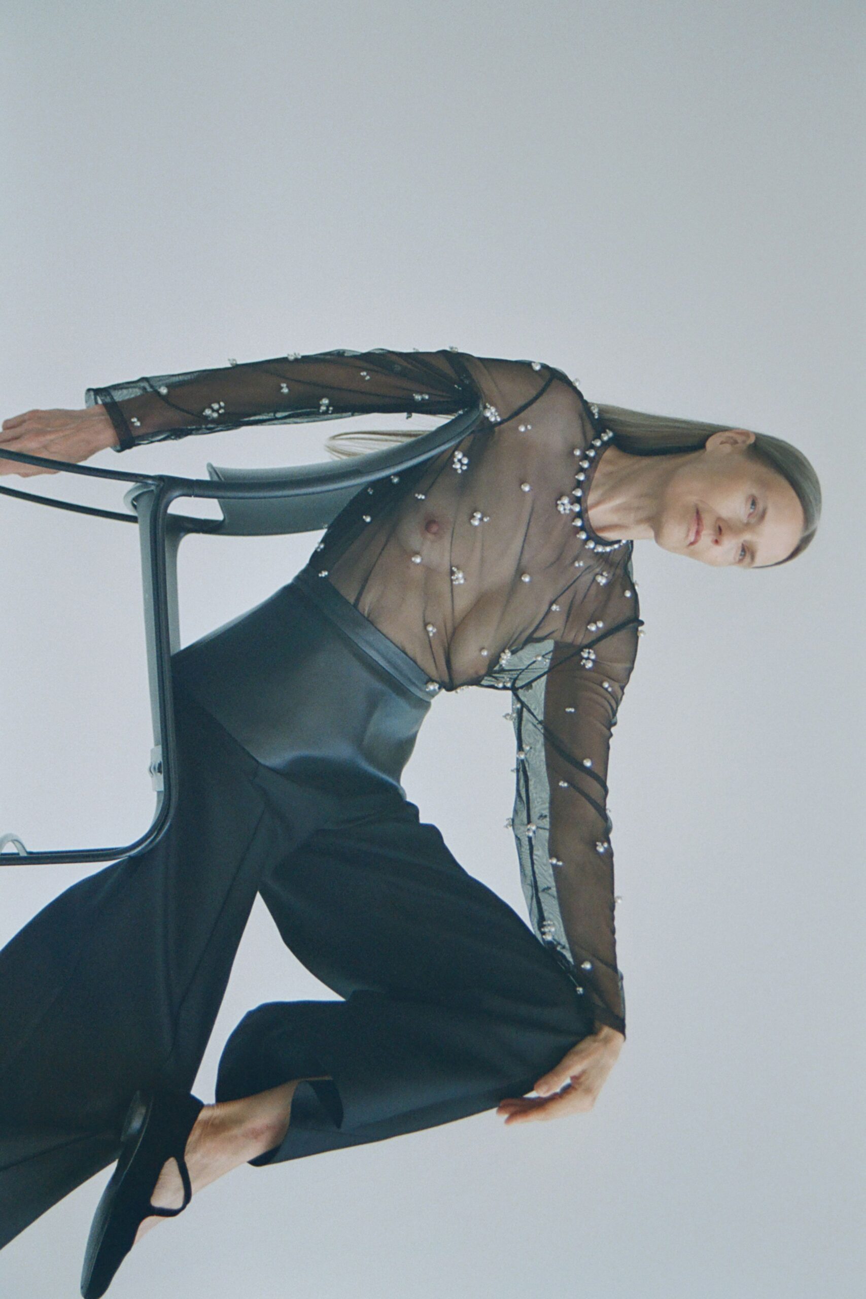 black mesh top with embroidered details