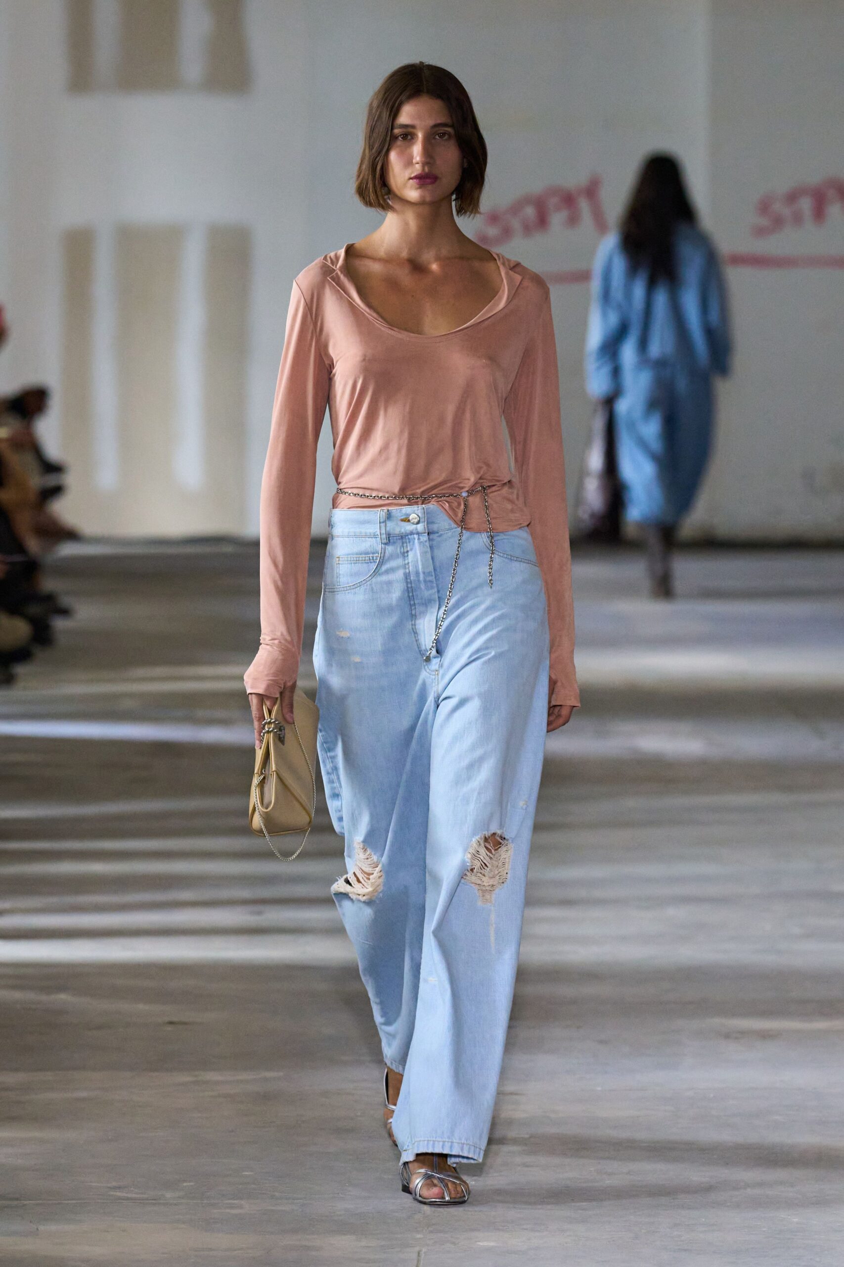 pink relaxed top with denim pants