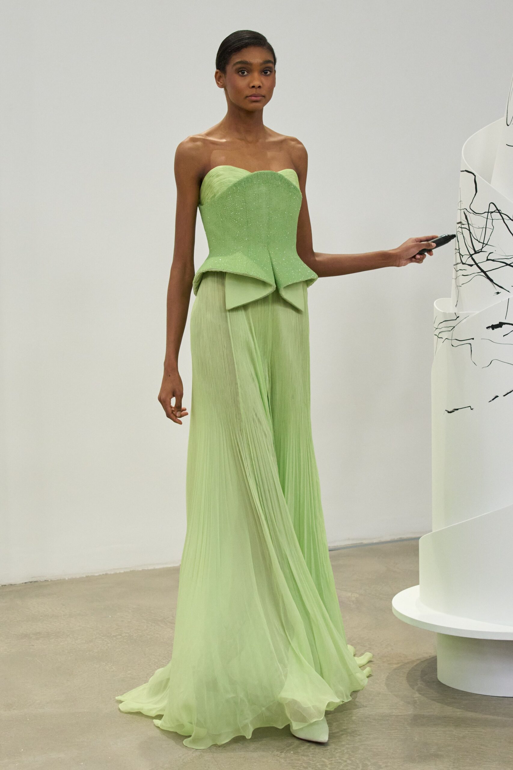 green silk strapless gown