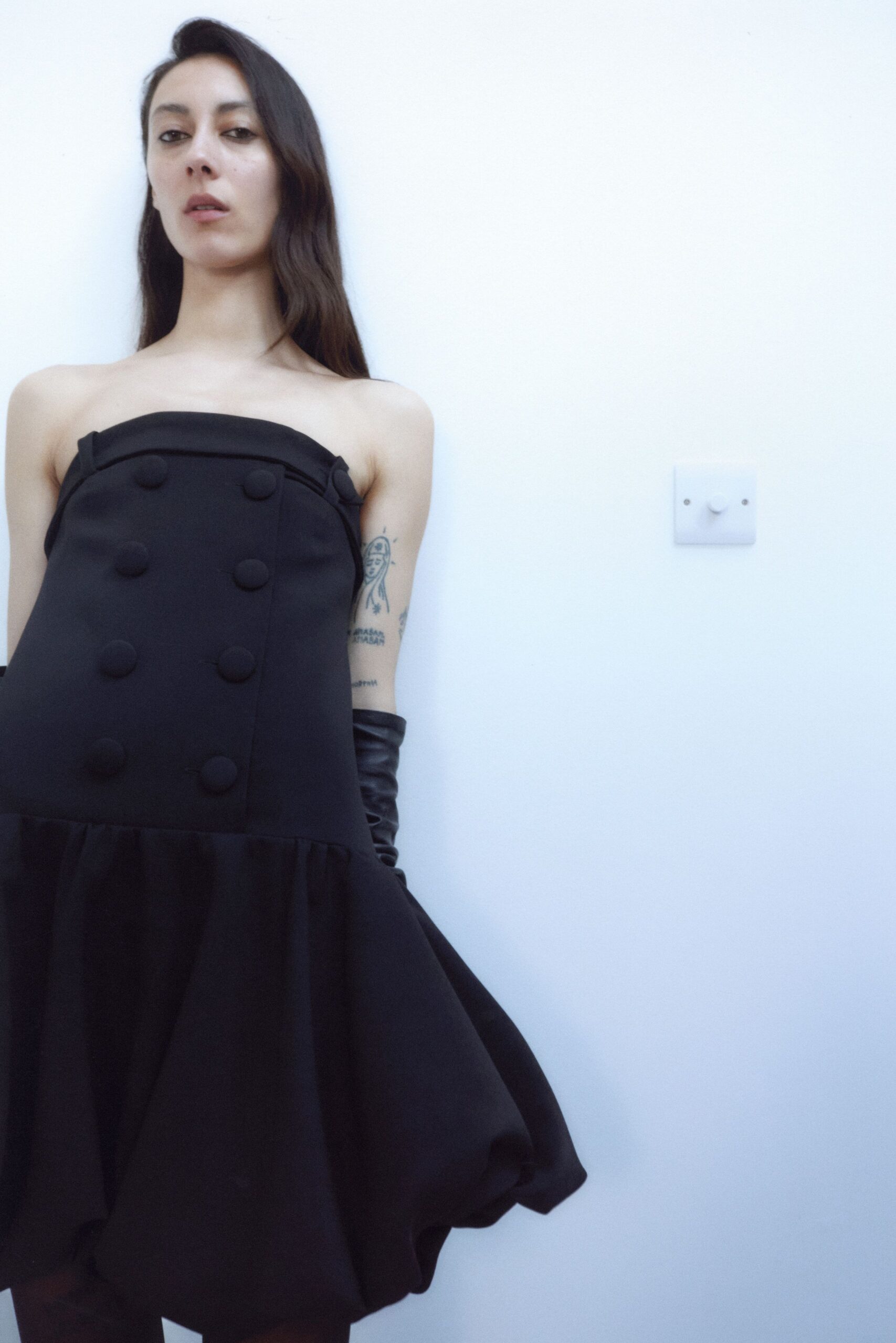 black strapless flared dress with gloves