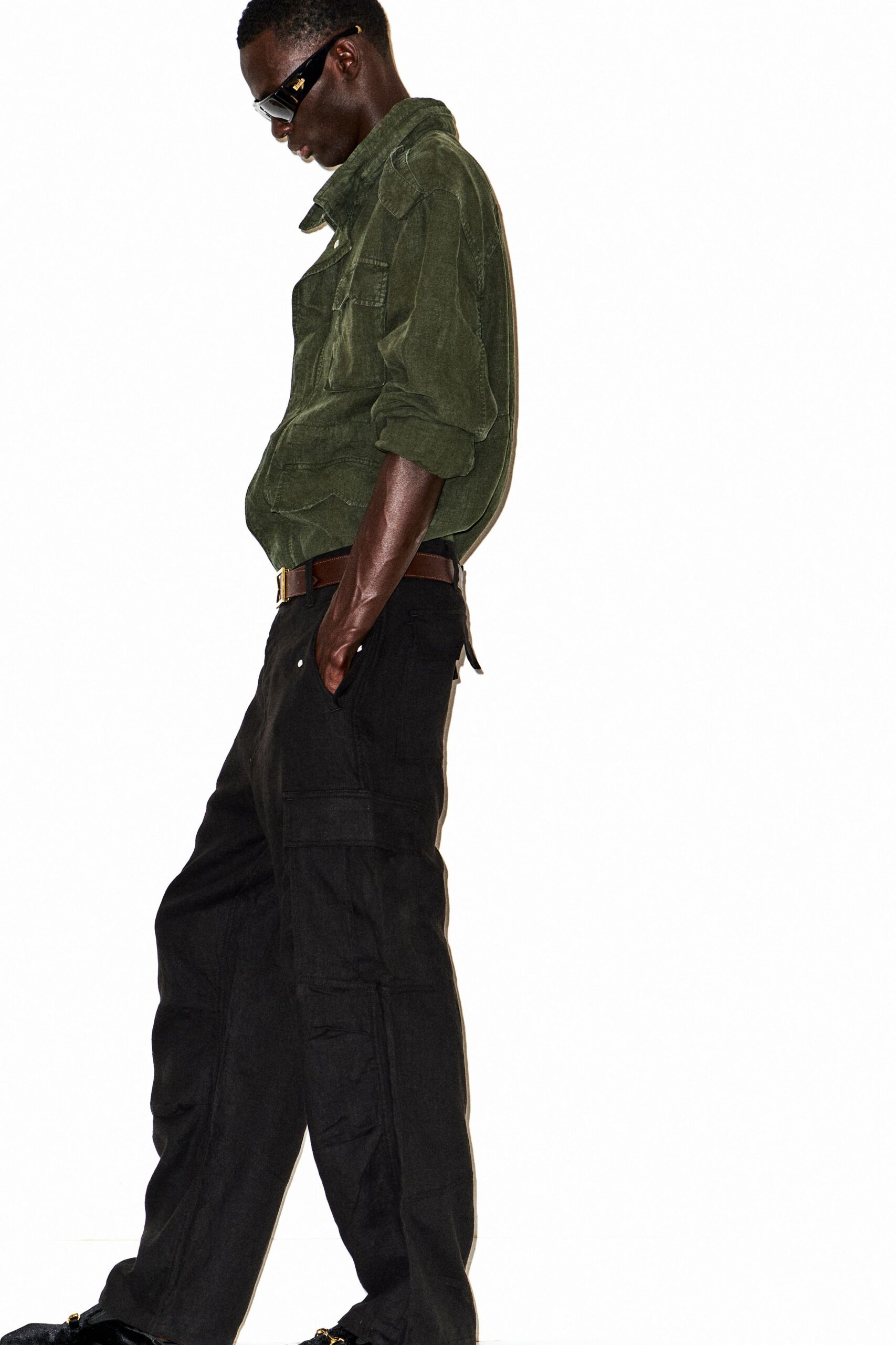 green relaxed jacket with black cargo pants