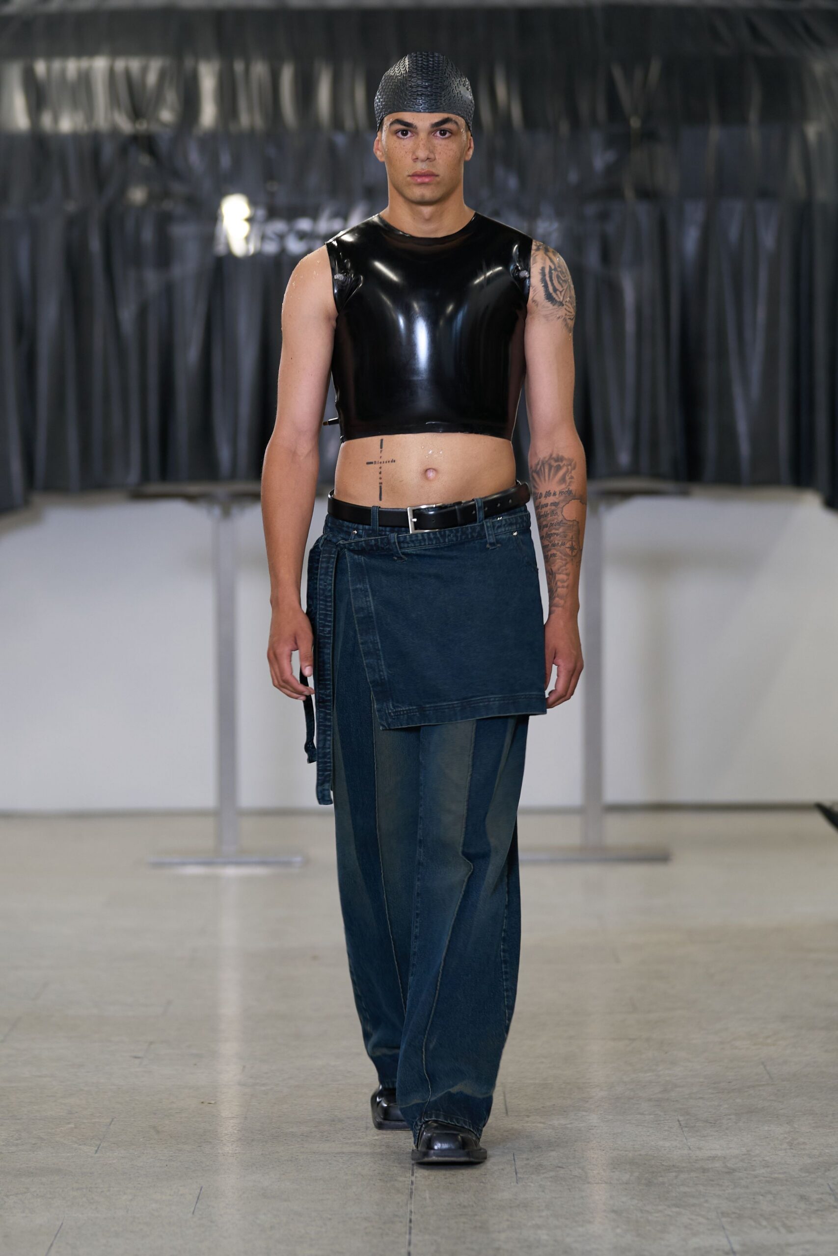 black vinyl sleeveless fitted top