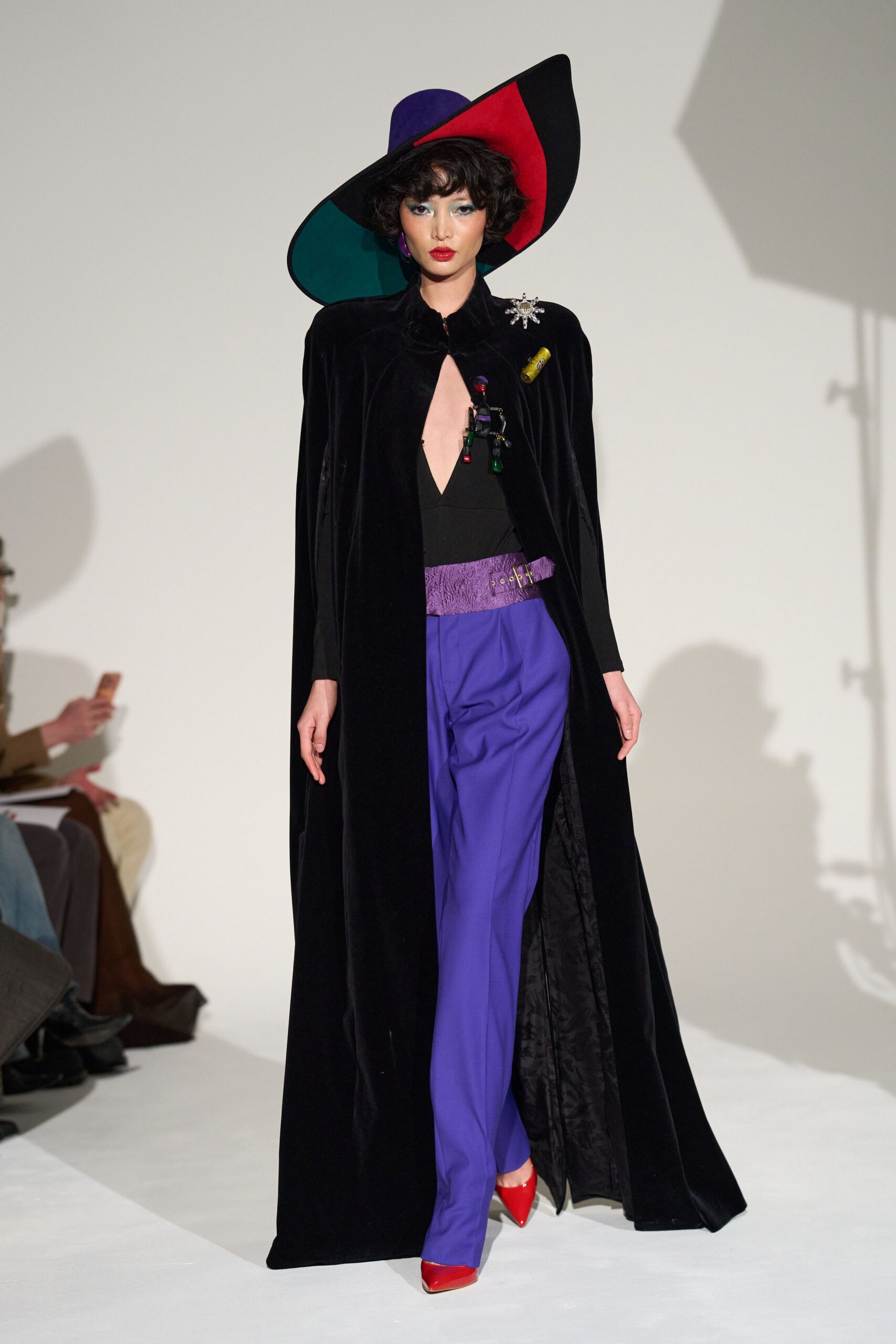 black velvet cape with purple pants