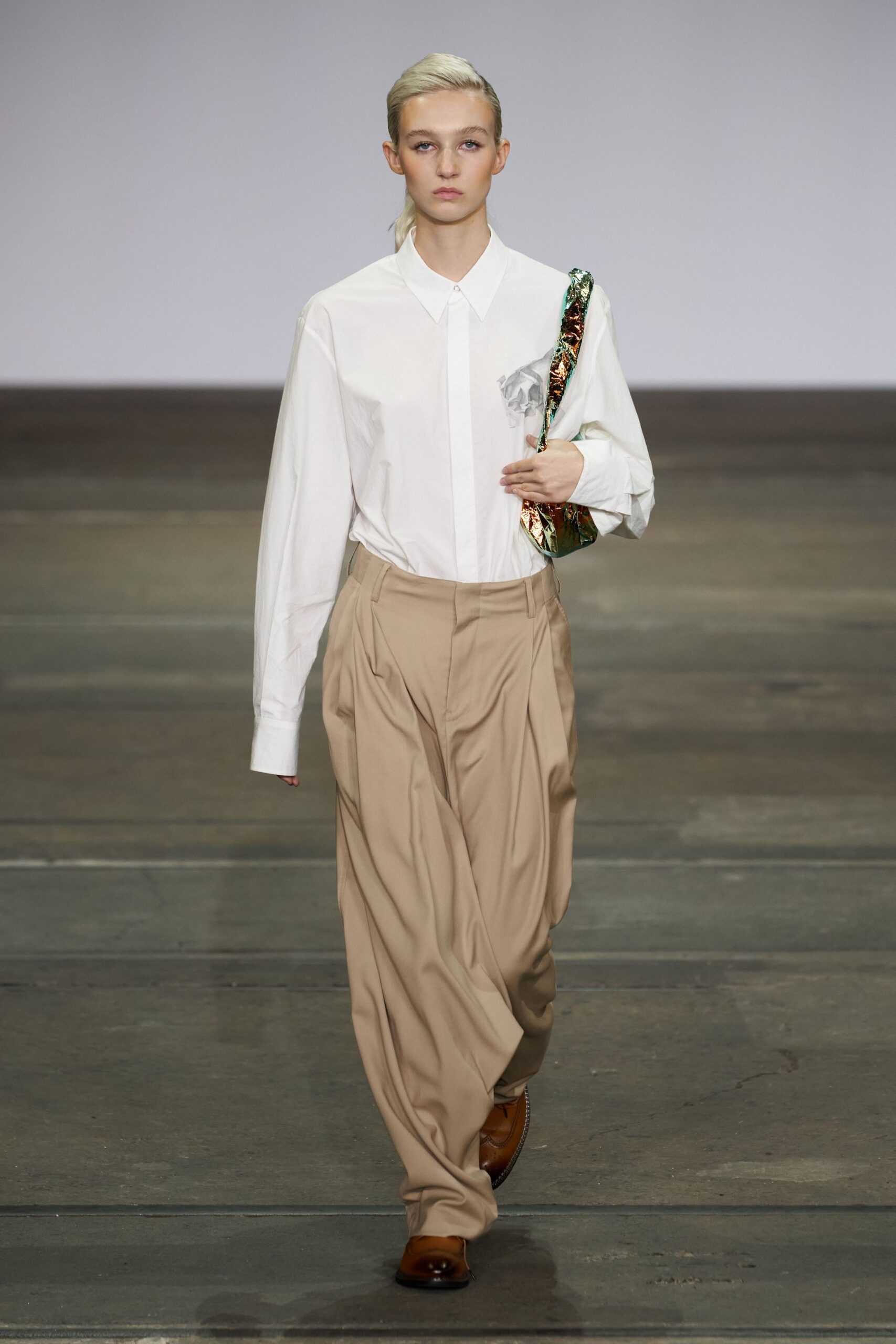 white shirt beige pants