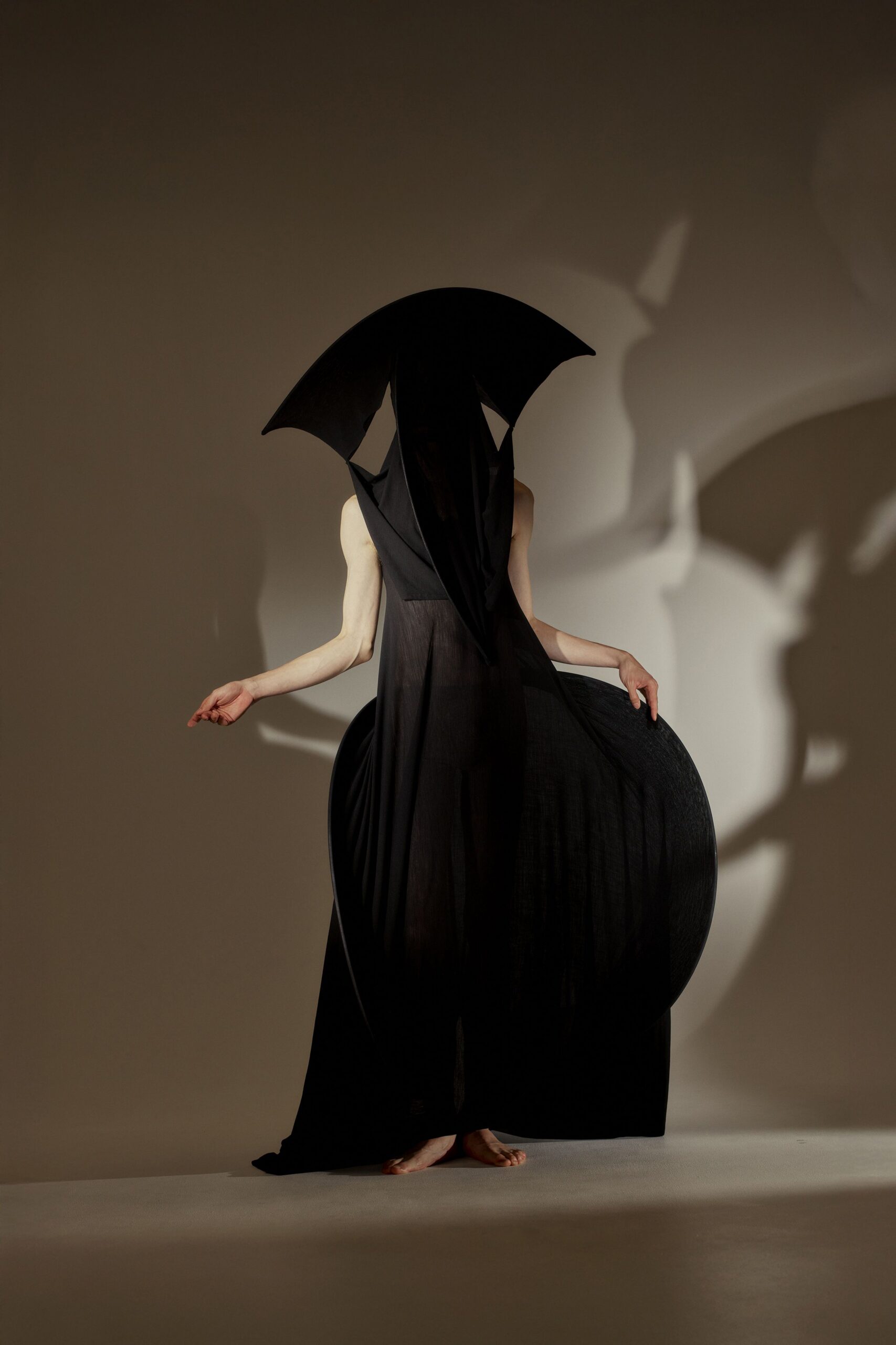 black silk sleeveless gown
