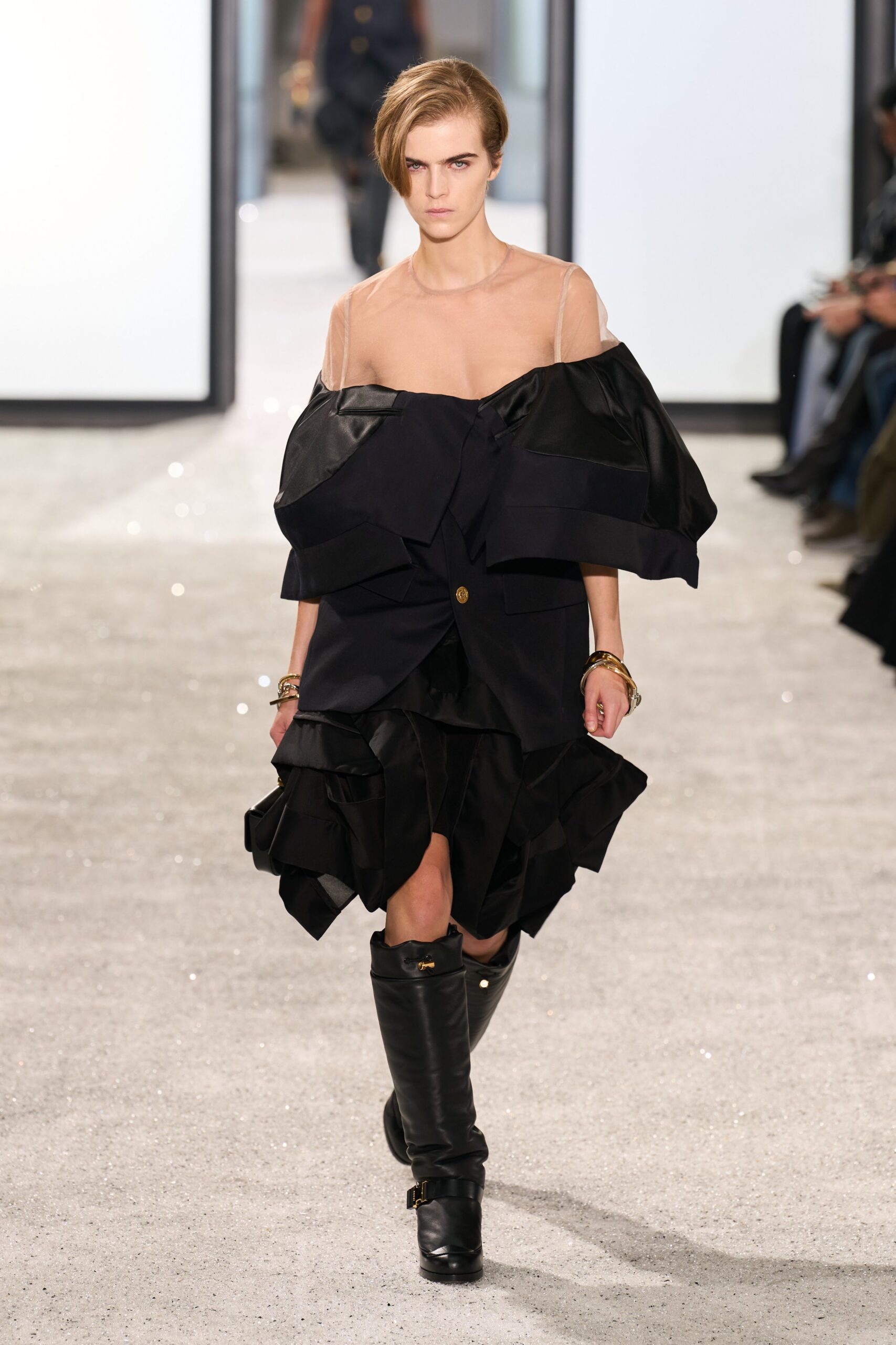 black ruffled midi dress with boots