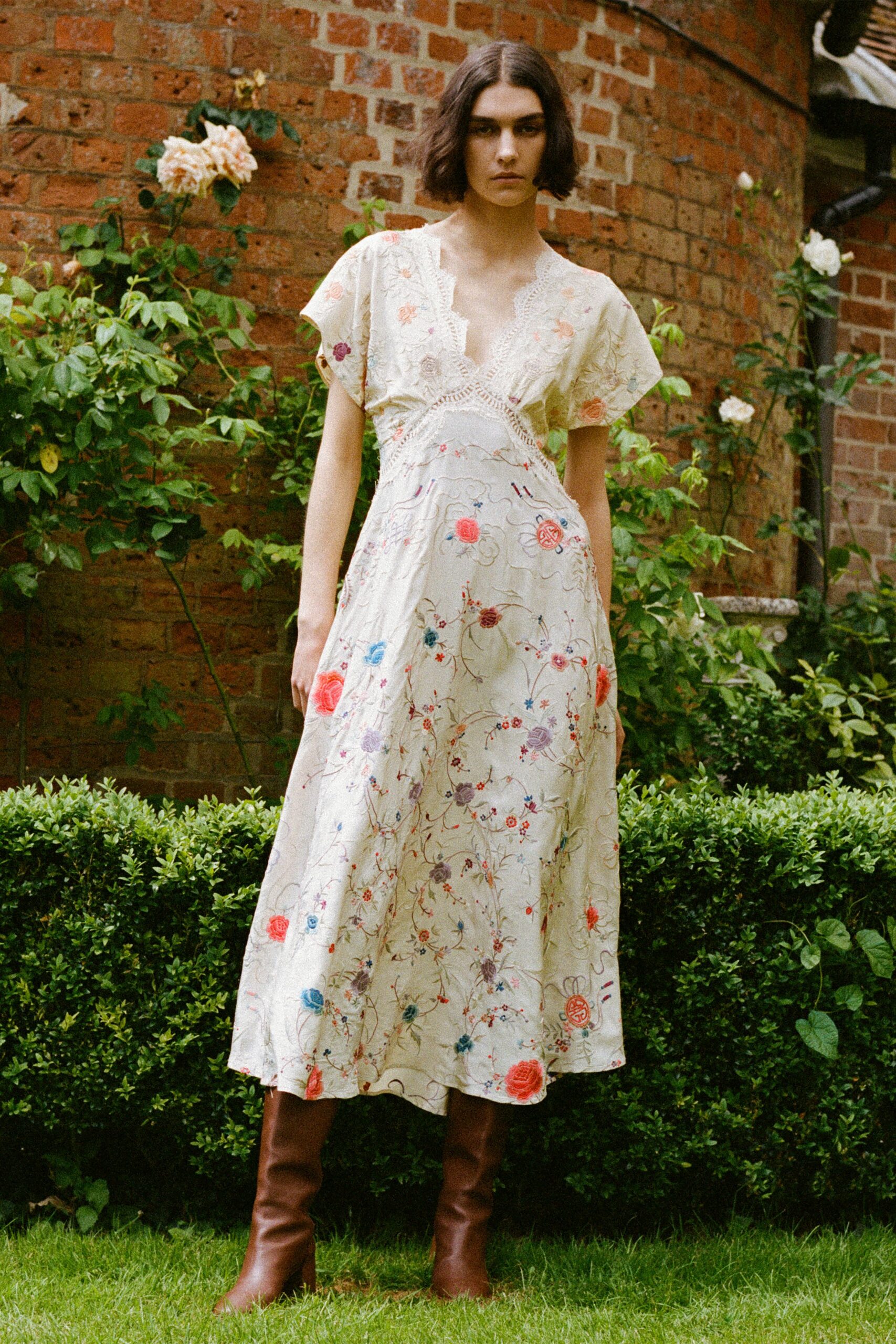 embroidered white maxi dress with brown boots
