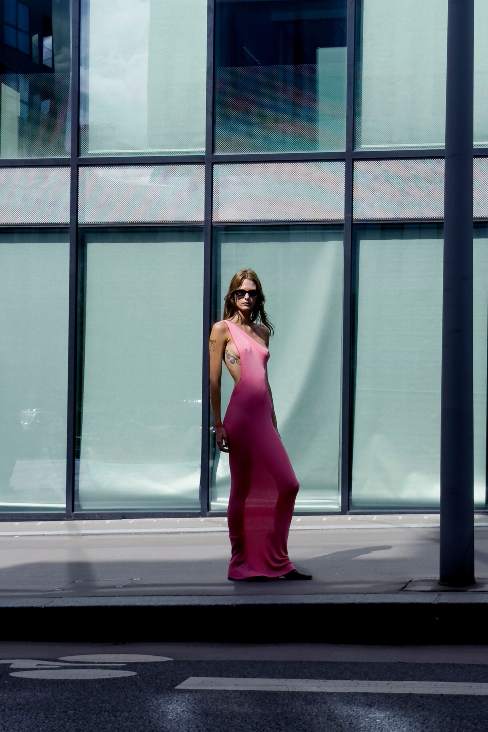 fitted pink maxi dress with sunglasses