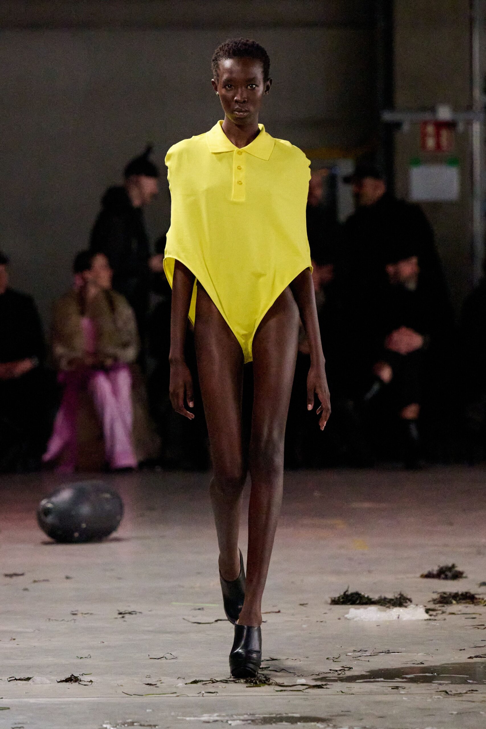 yellow bodysuit with black shoes