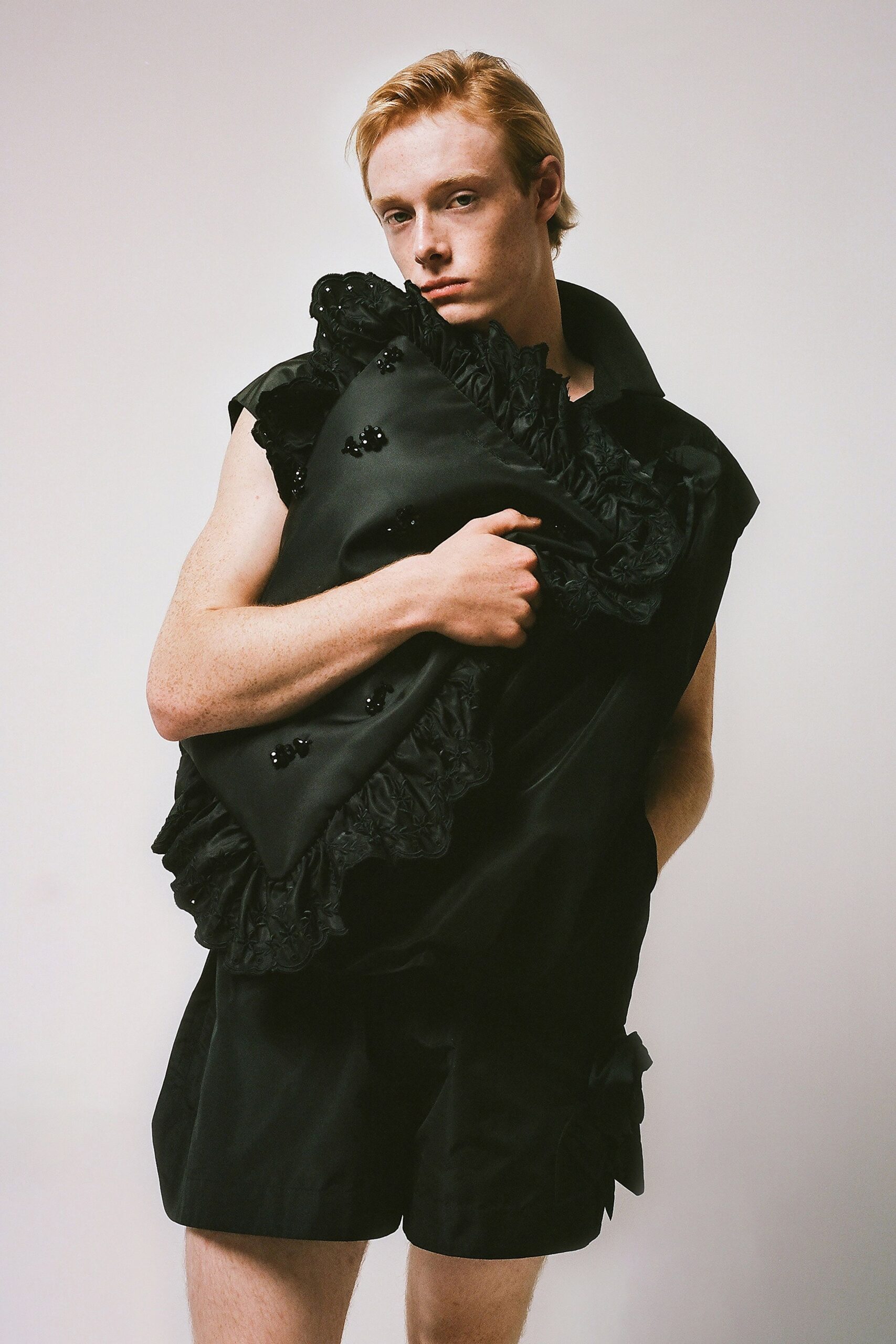black silk sleeveless top and shorts