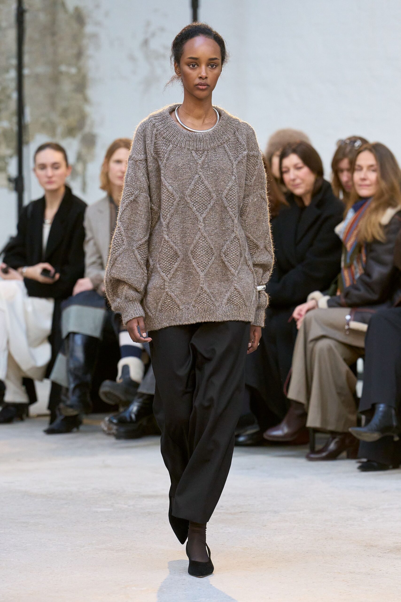 oversized brown sweater with relaxed black pants