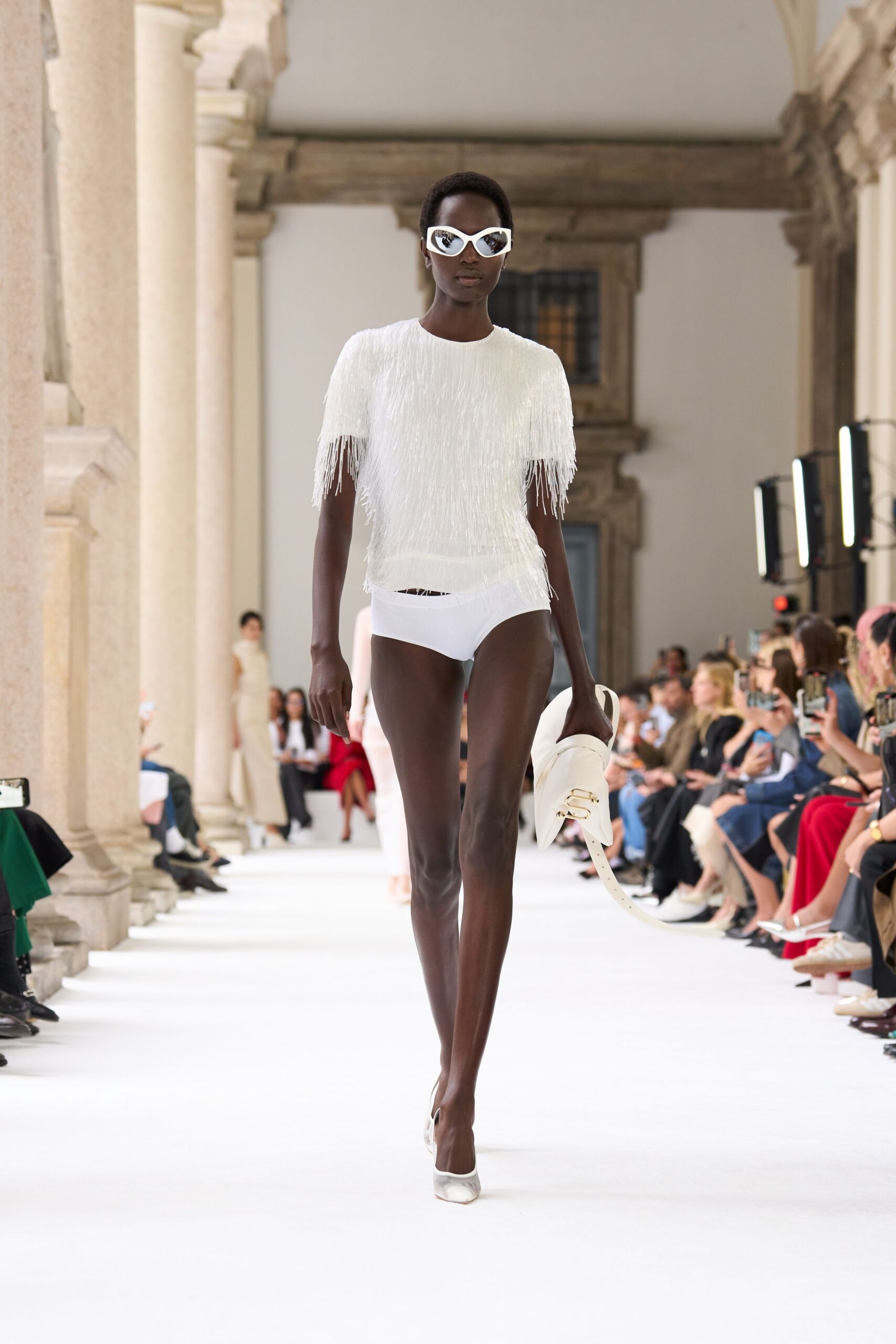 white fringed top with shorts