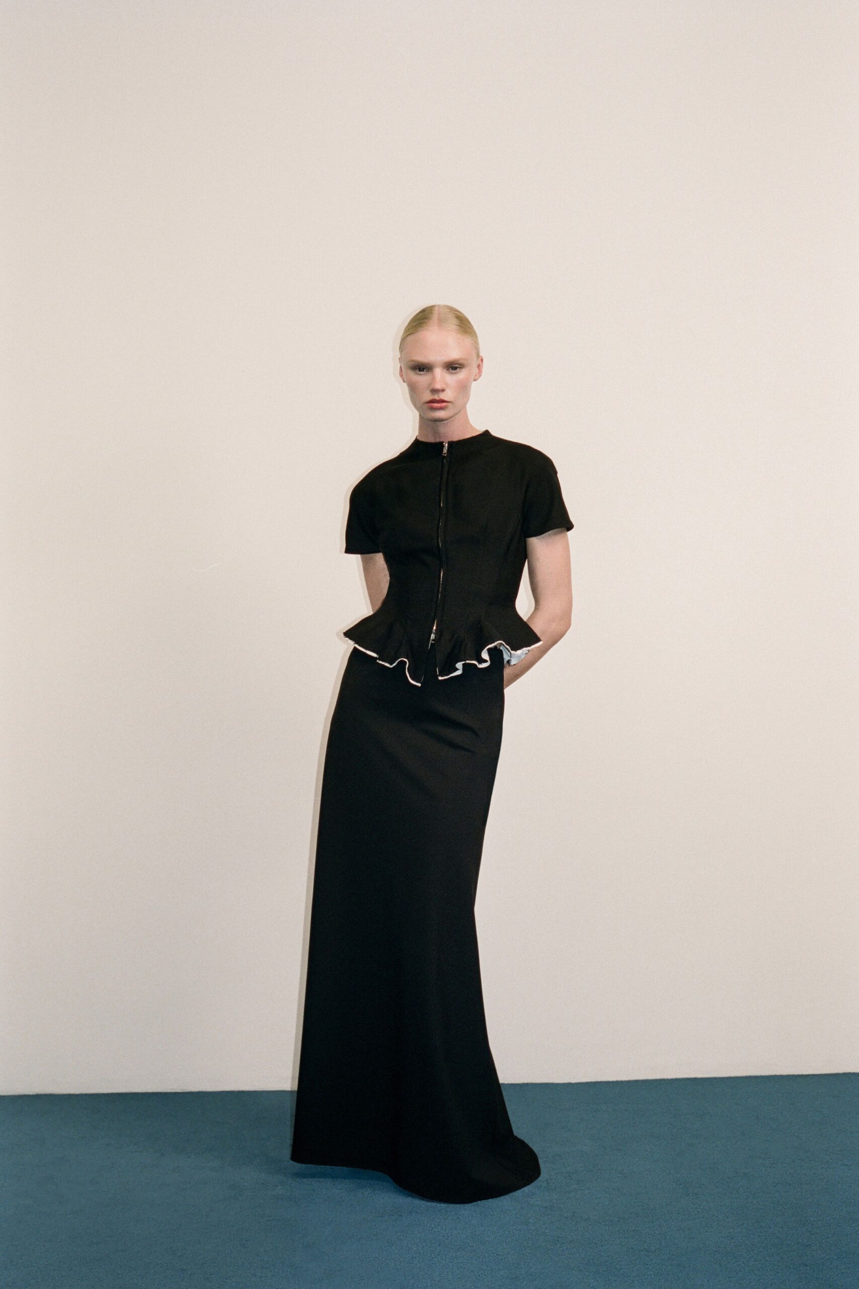 black fitted top and skirt