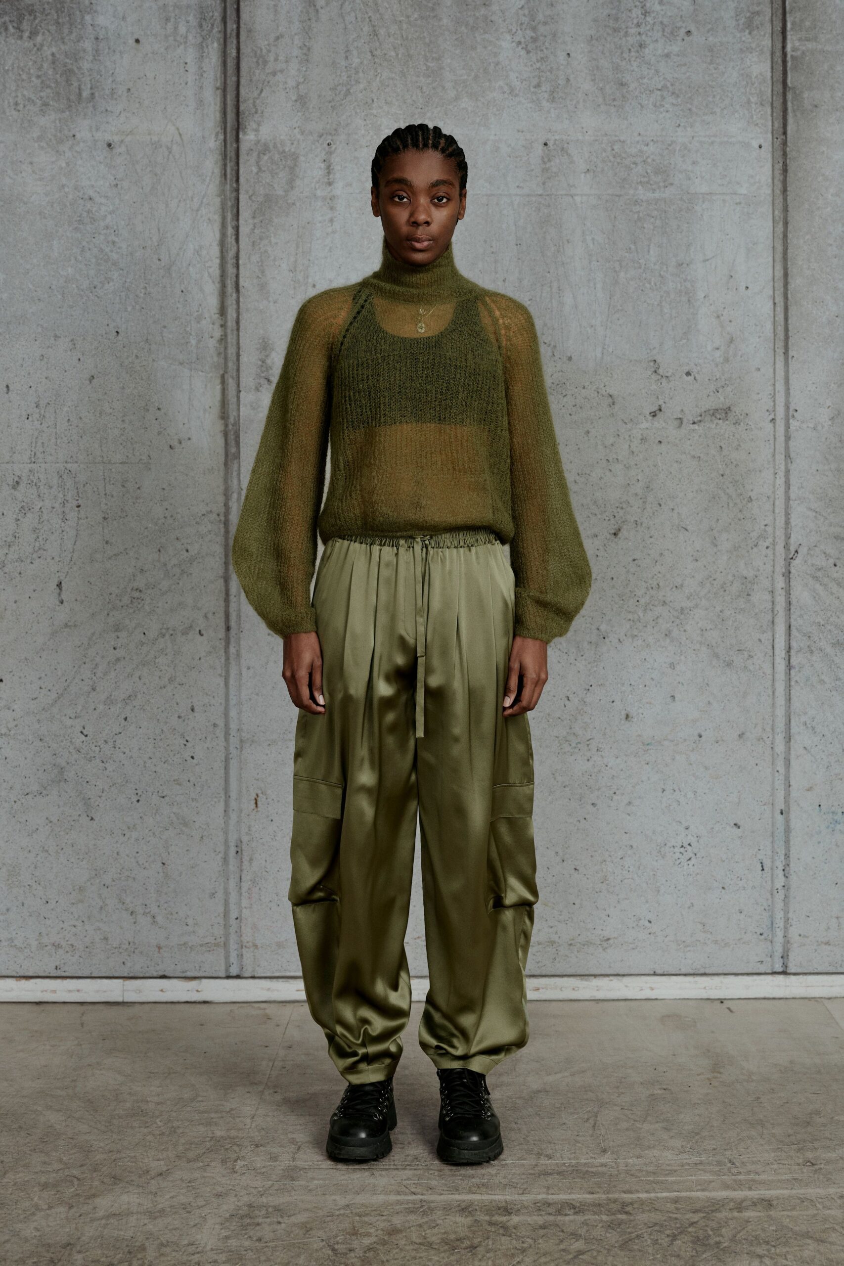 green knit long-sleeve high-neck relaxed sheer flowing top