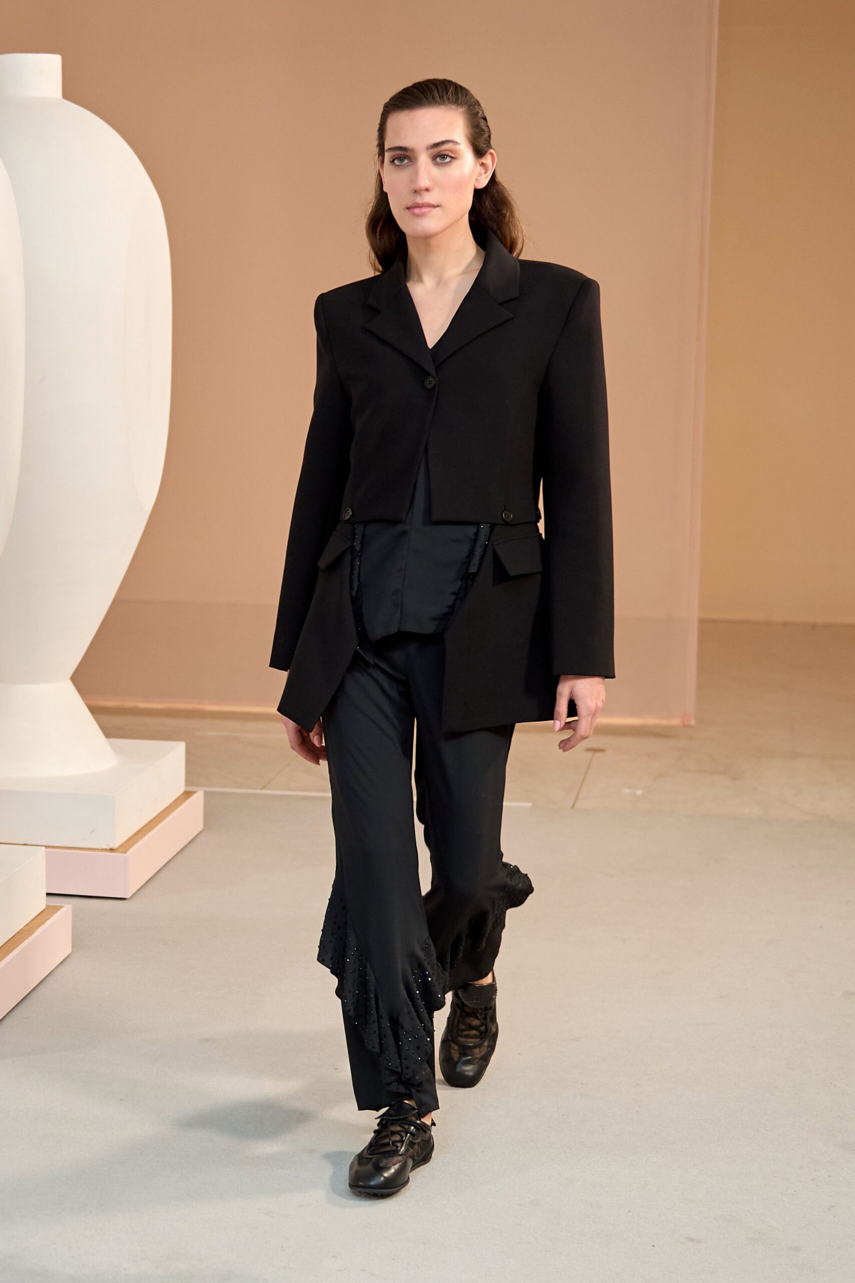black structured blazer with fitted pants