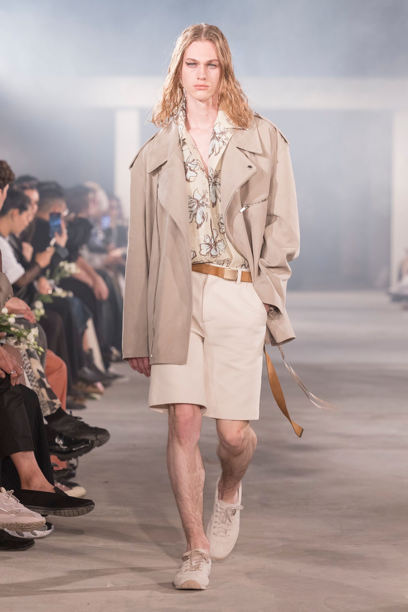beige jacket white shirt shorts