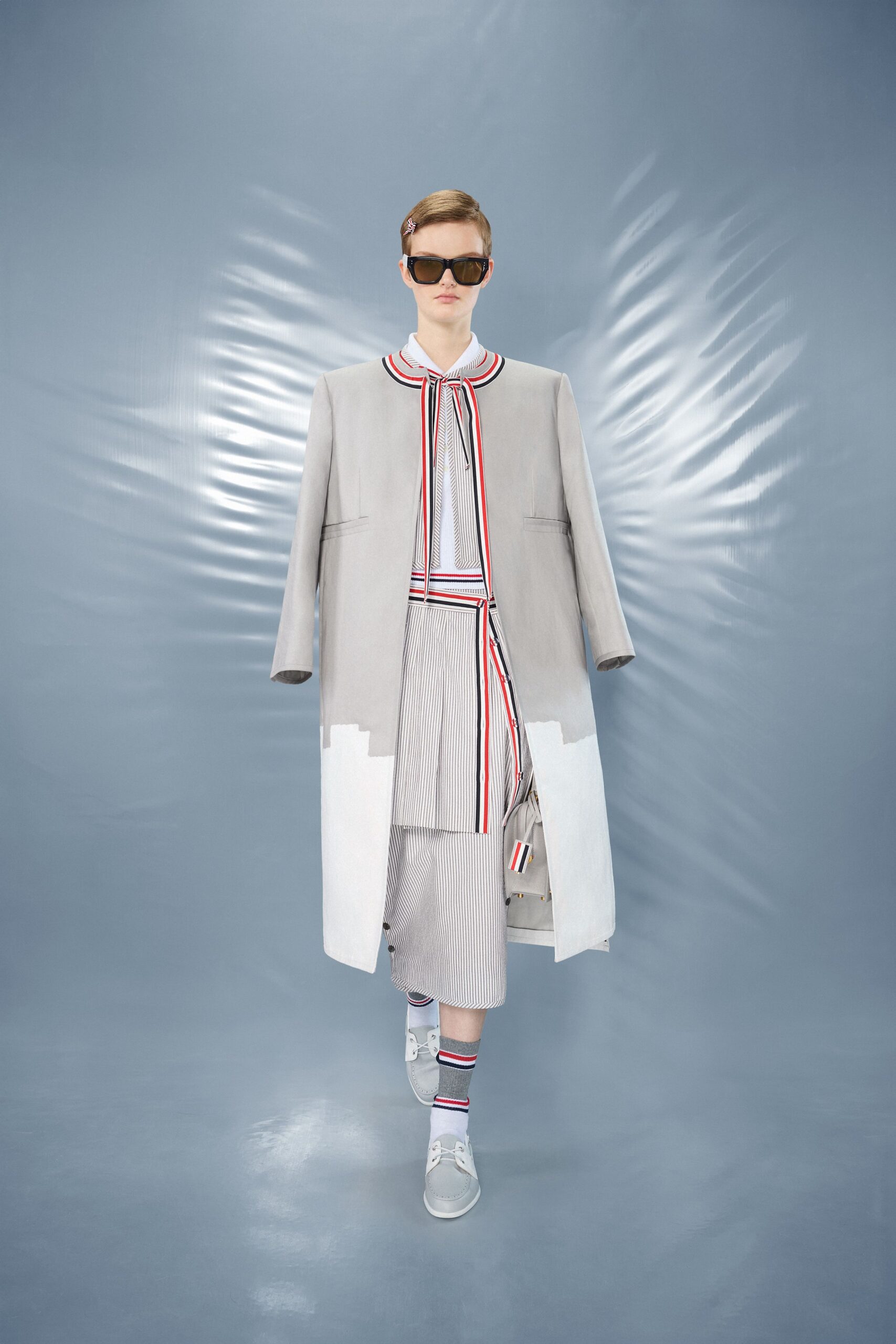 gray coat with striped shirt and skirt