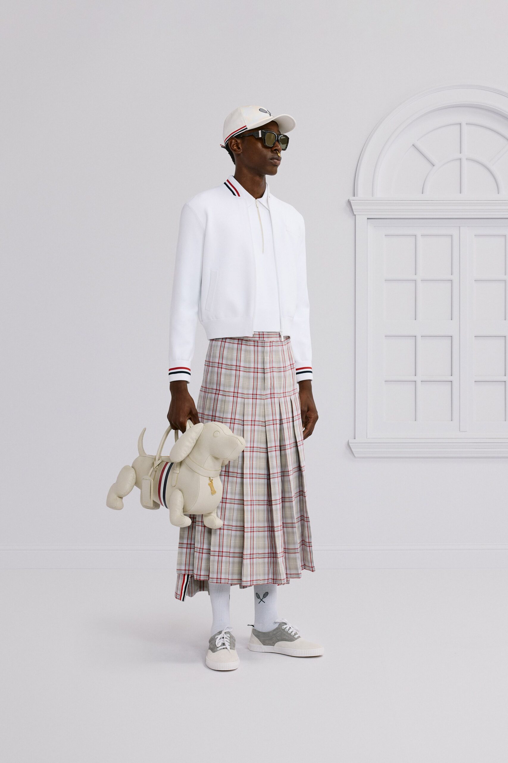 white jacket beige pleated skirt