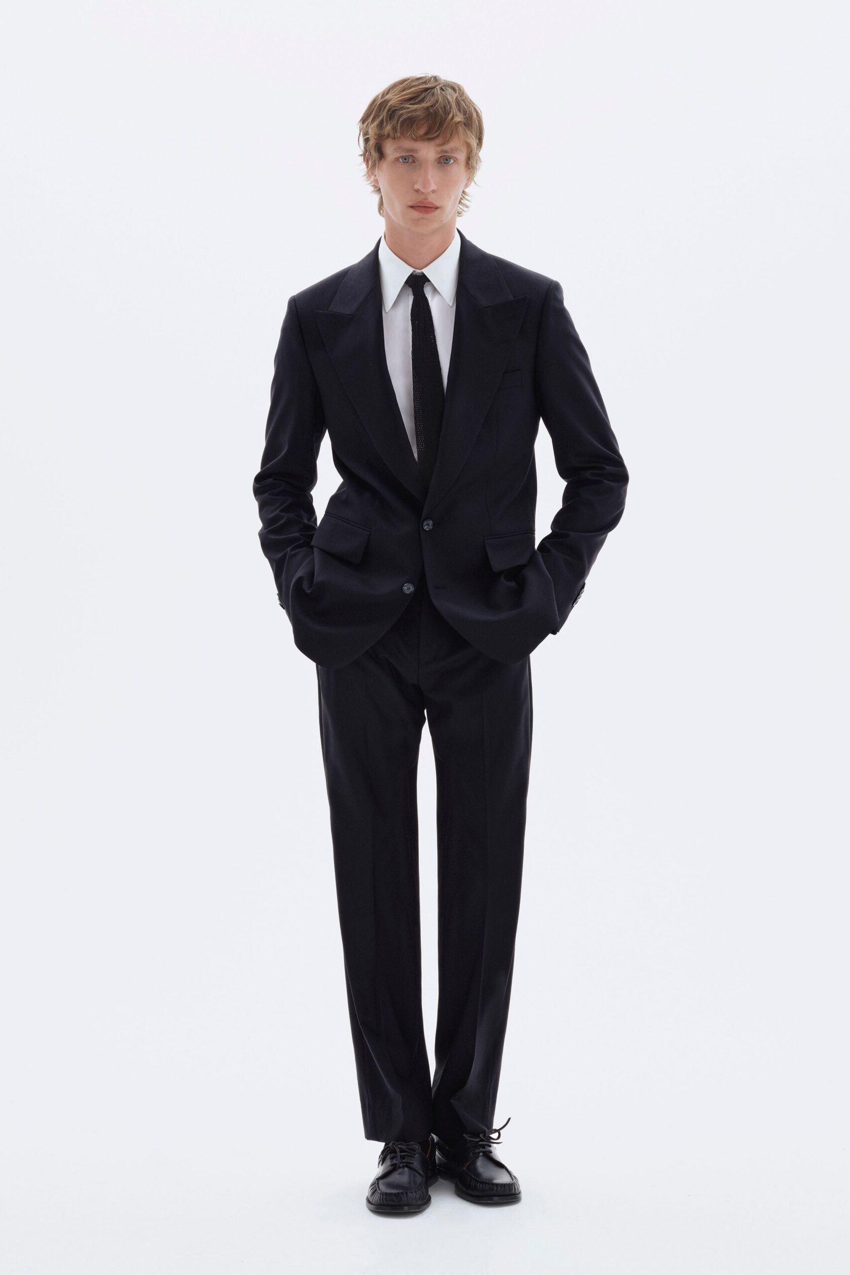 black tailored suit with tie