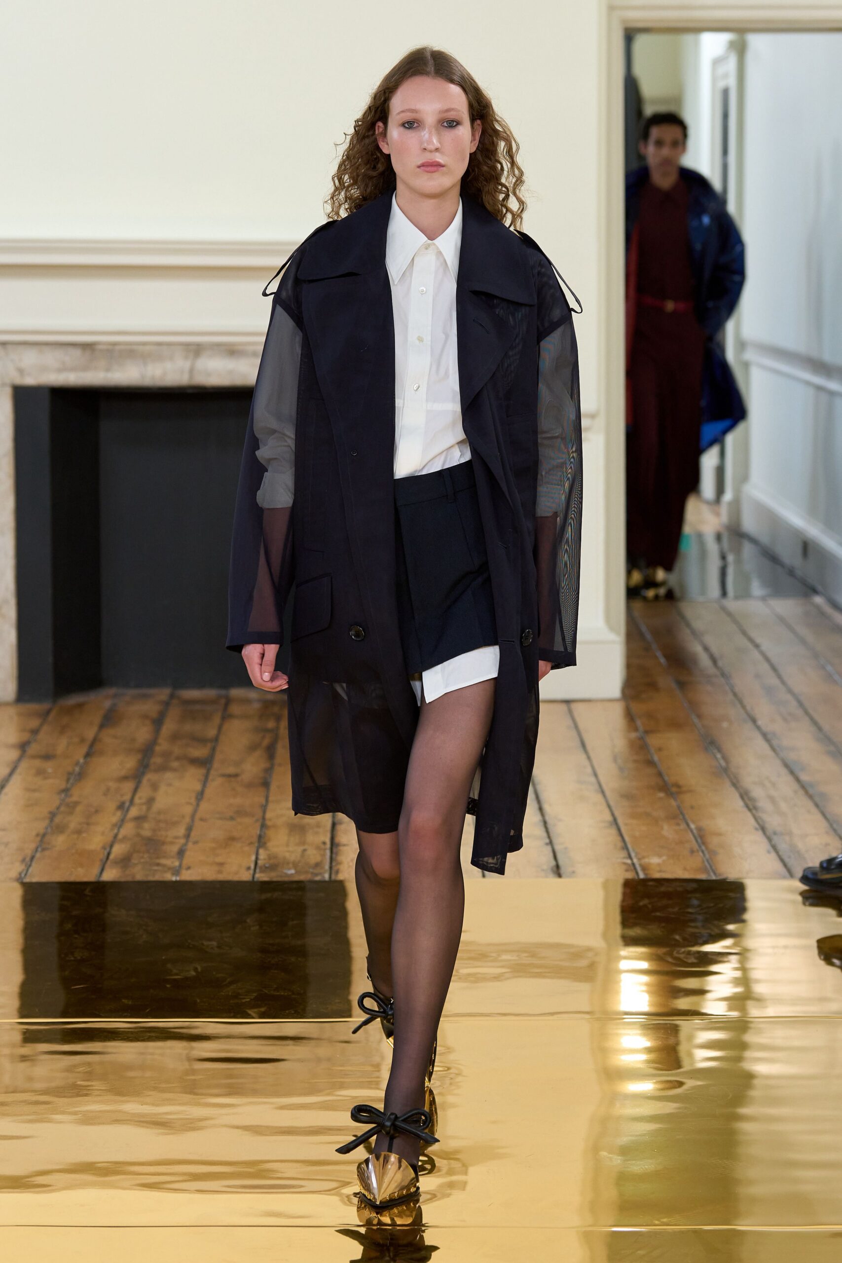 black cotton long-sleeve collared relaxed layered coat