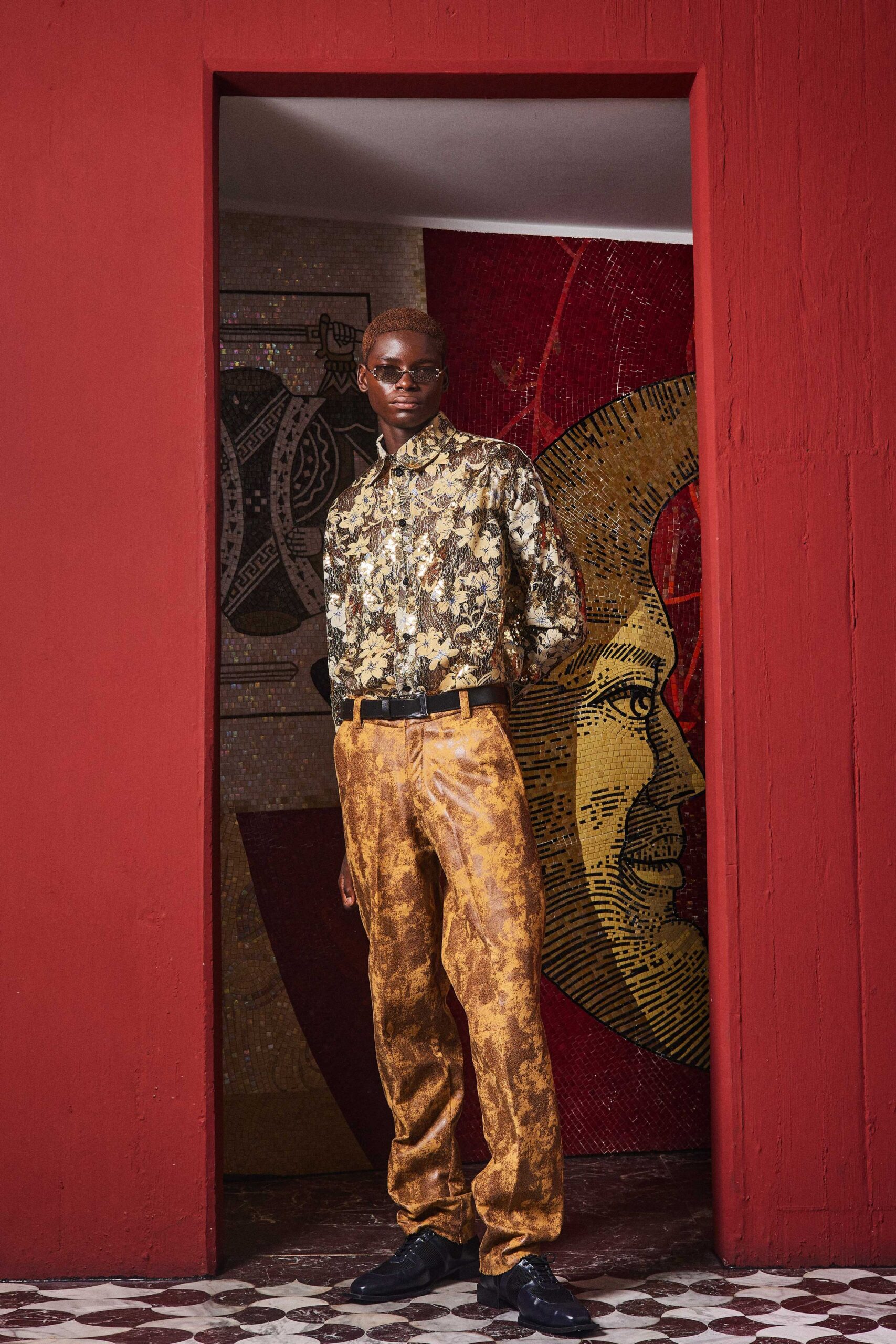printed long-sleeve shirt with gold pants