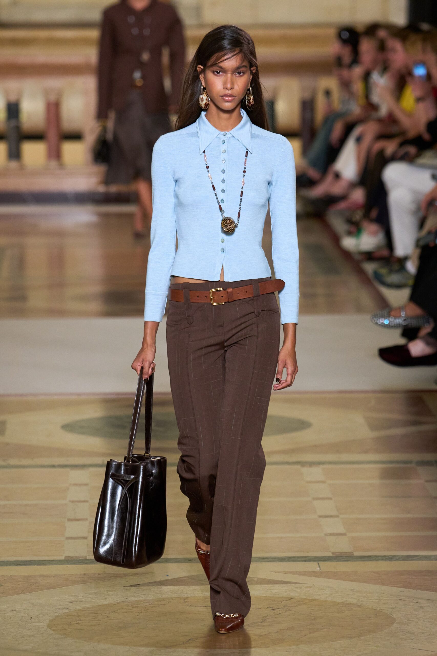 blue fitted top brown tailored pants