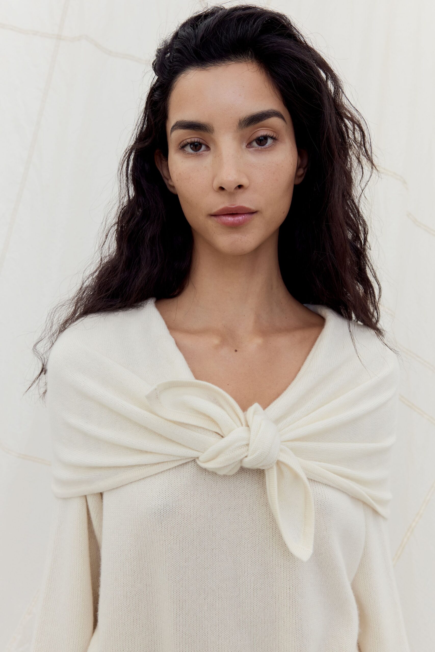 white relaxed v-neck sweater