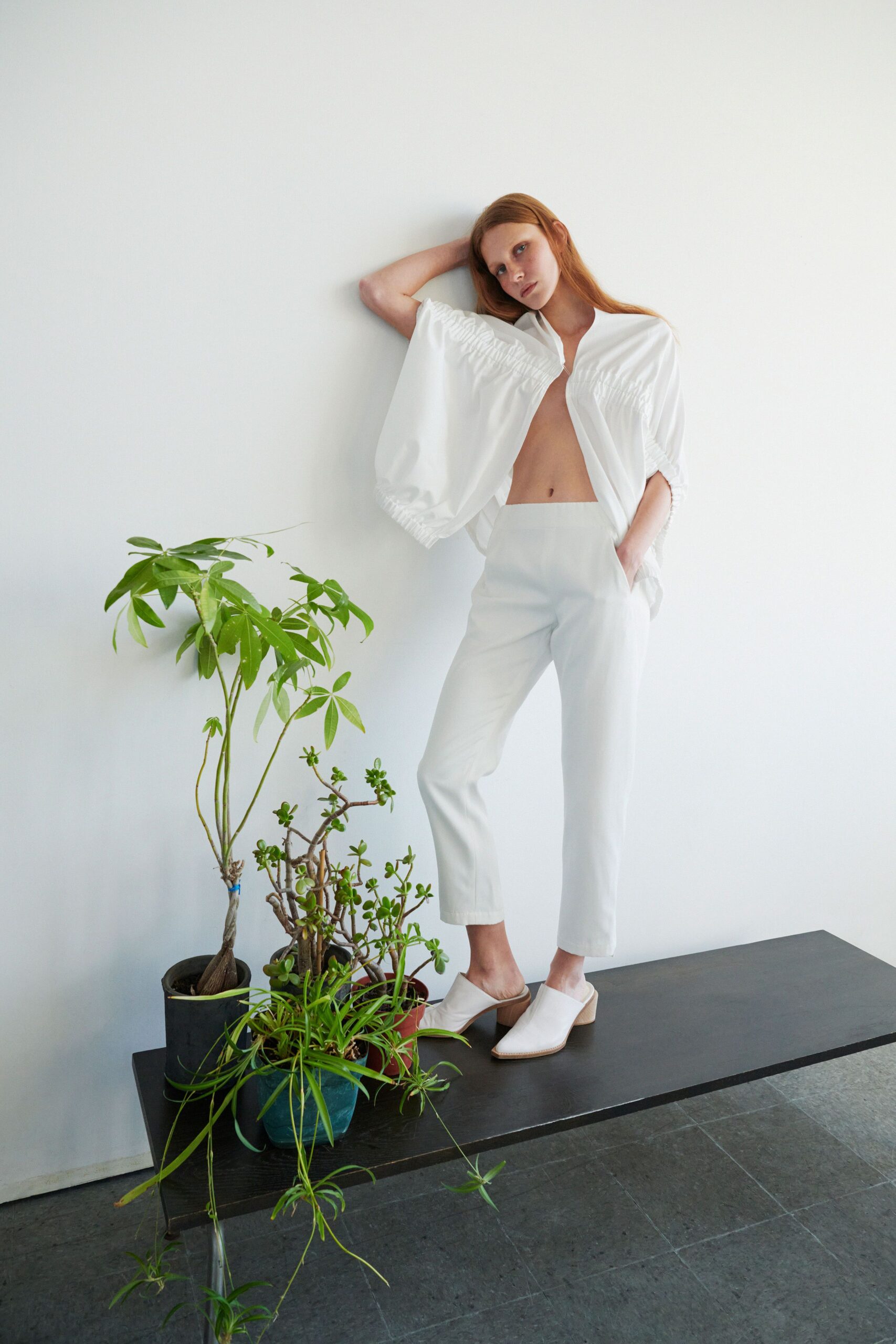 white silk long-sleeve collared relaxed buttoned shirt