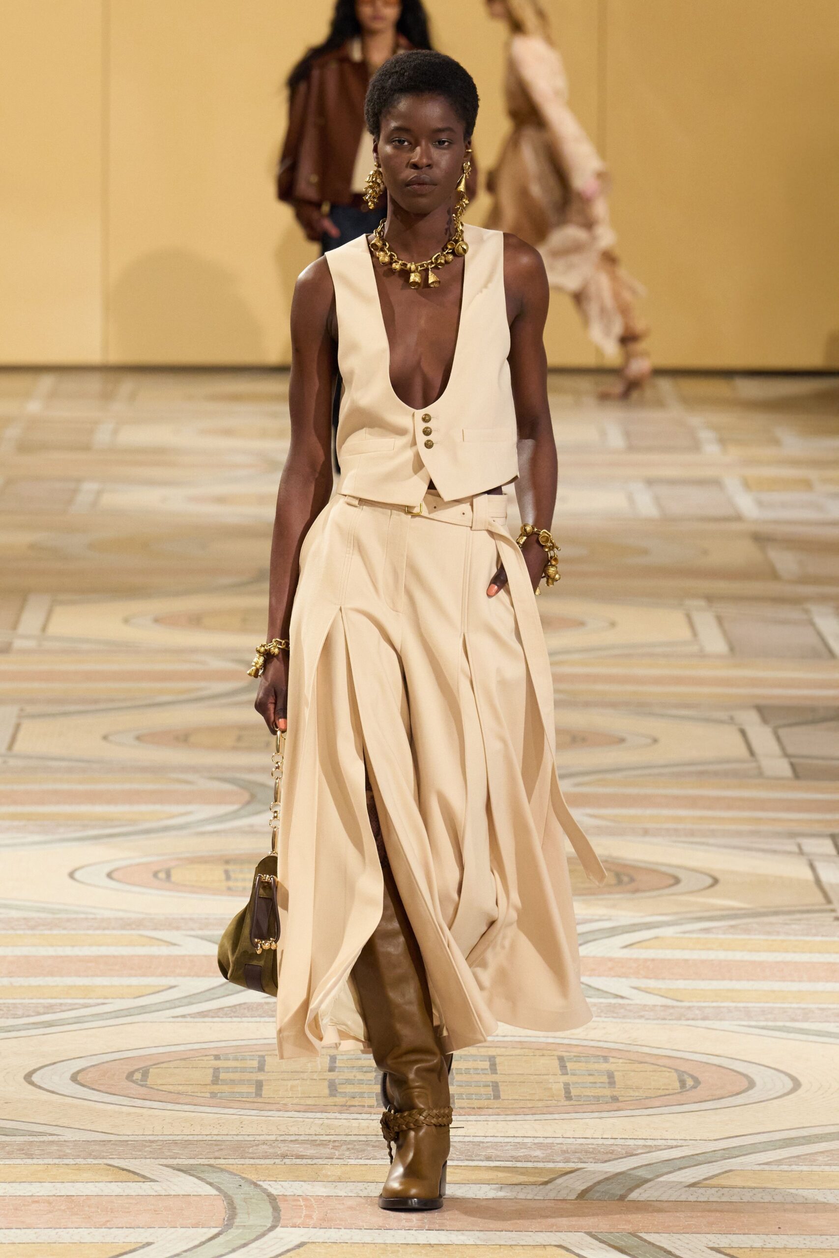 beige silk sleeveless v-neck fitted buttoned vest