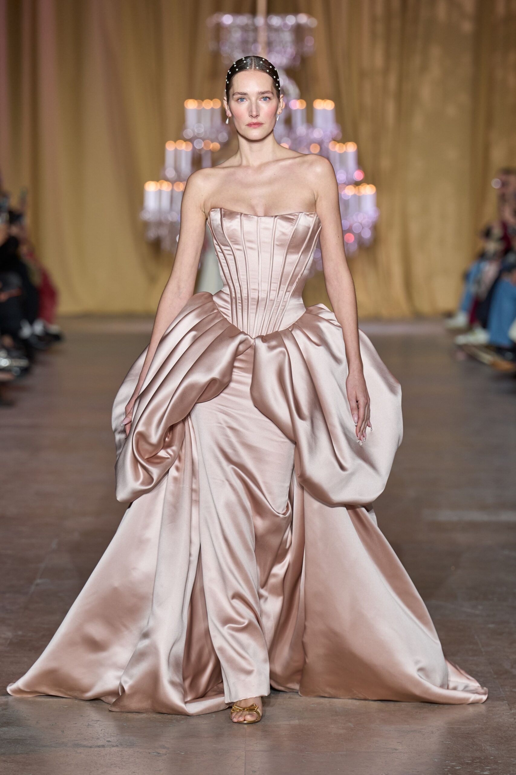 pink satin strapless fitted pleated draped gown