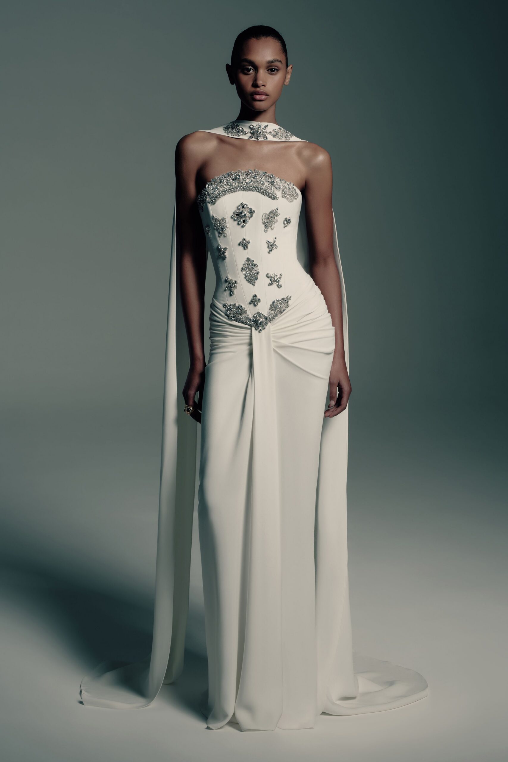 white embellished sleeveless gown