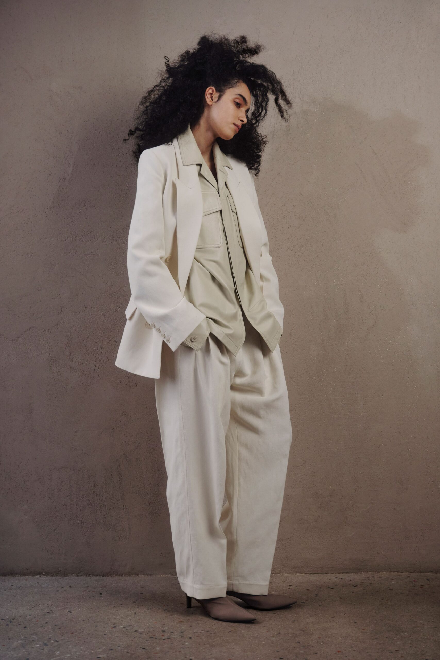 white tailored blazer with relaxed shirt and pants